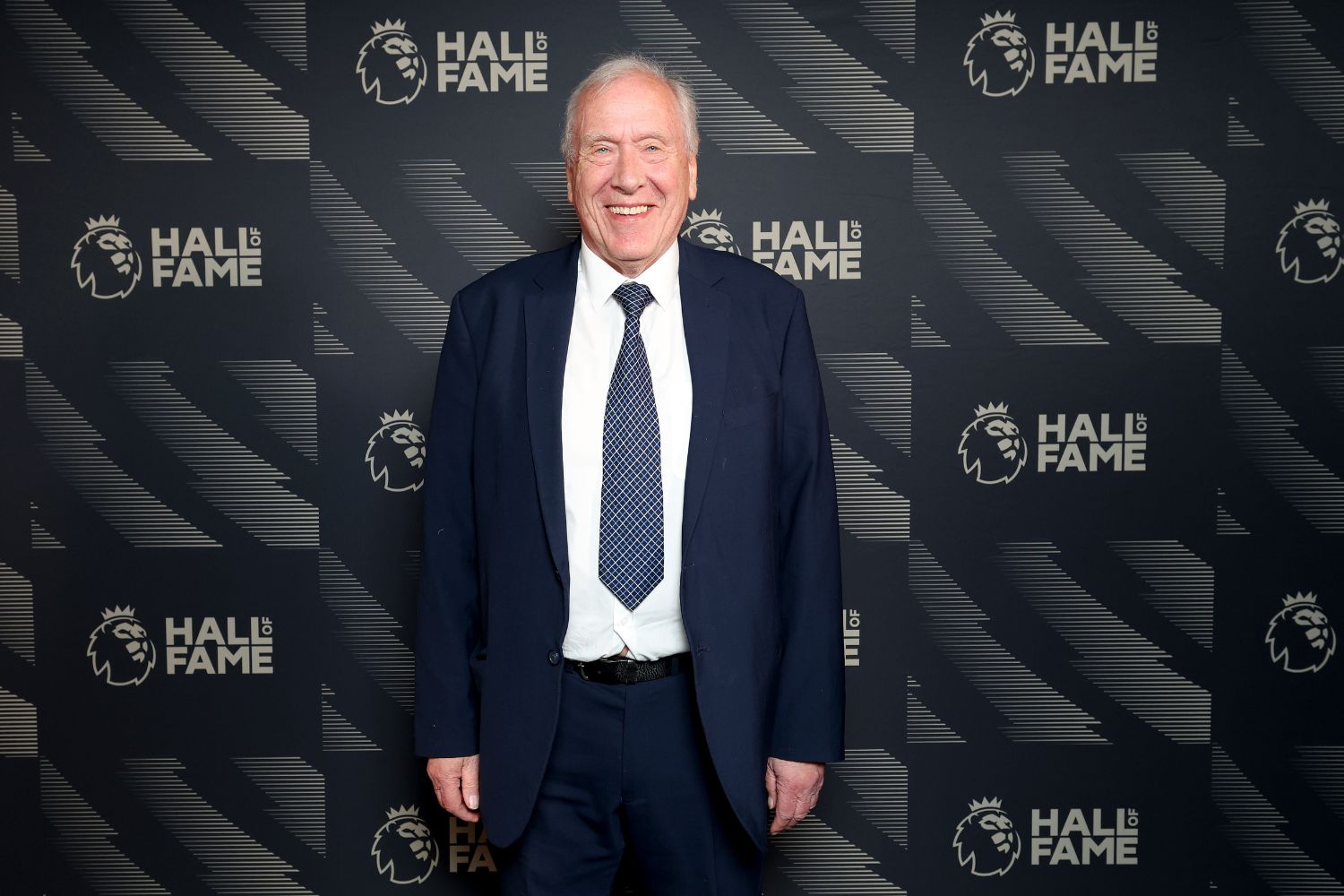 Martin Tyler poses for pictures
