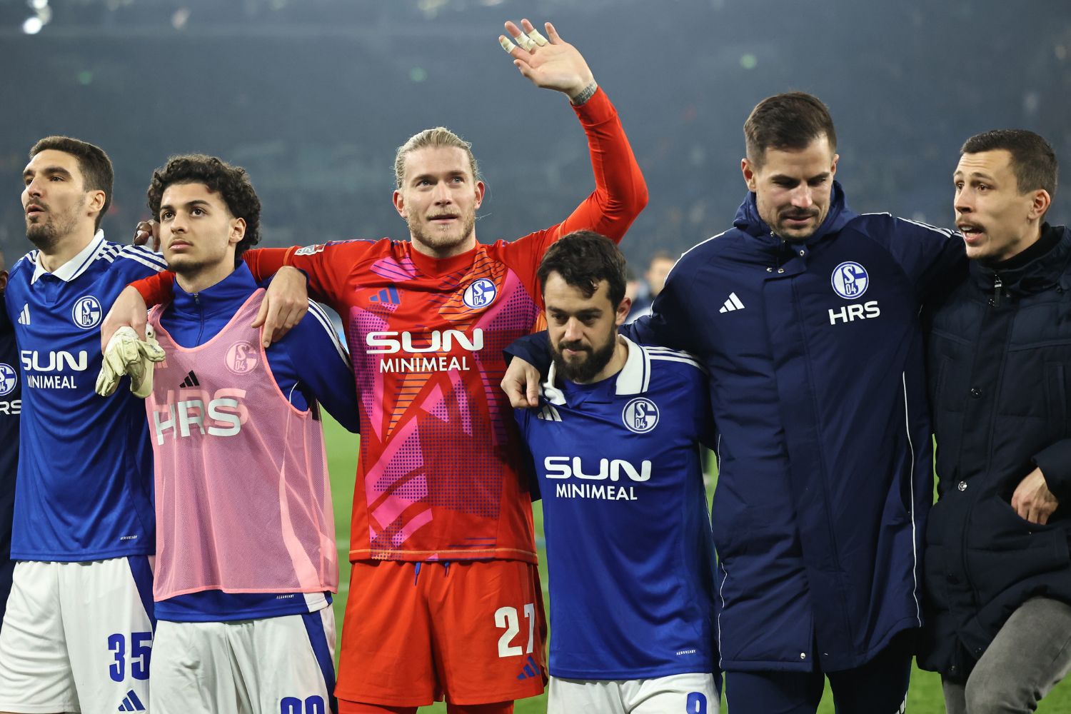 Loris Karius celebrates after victory over Schalke