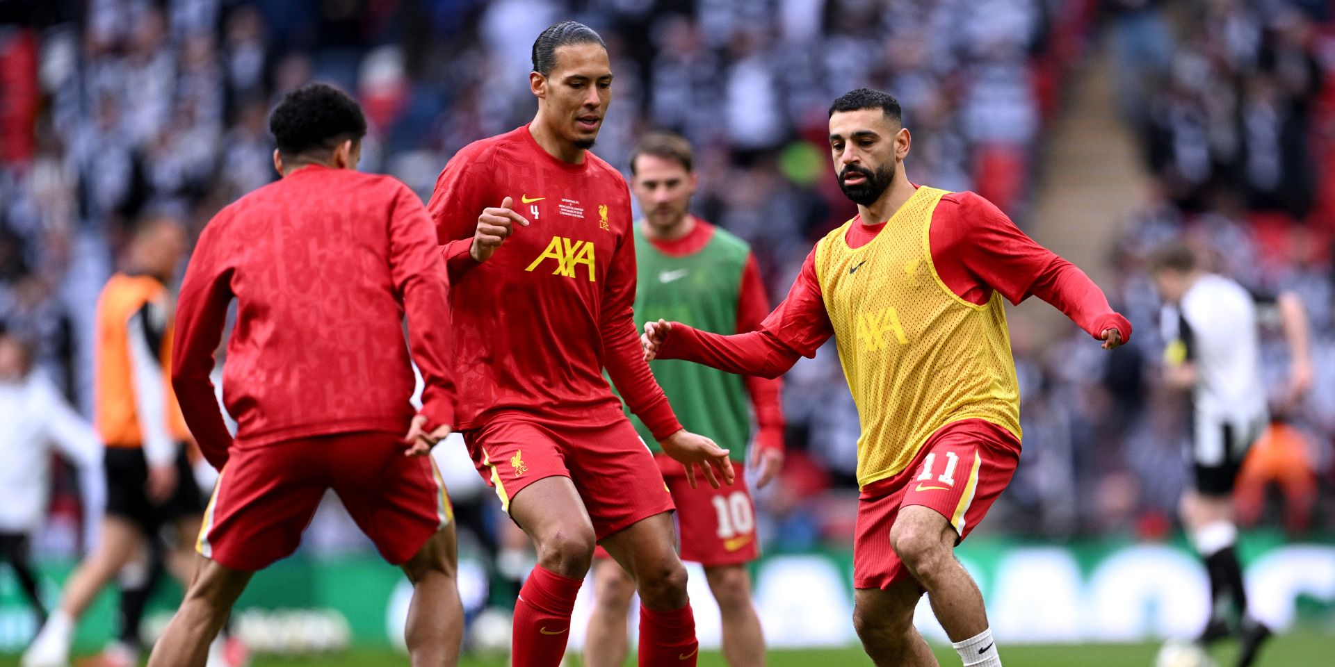 Mo Salah and Virgil van Dijk warm up for Liverpool
