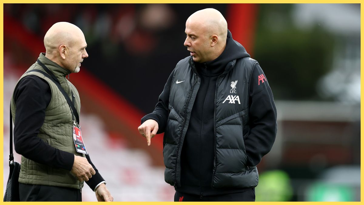 Arne Slot points to the turf at the Vitality Stadium.