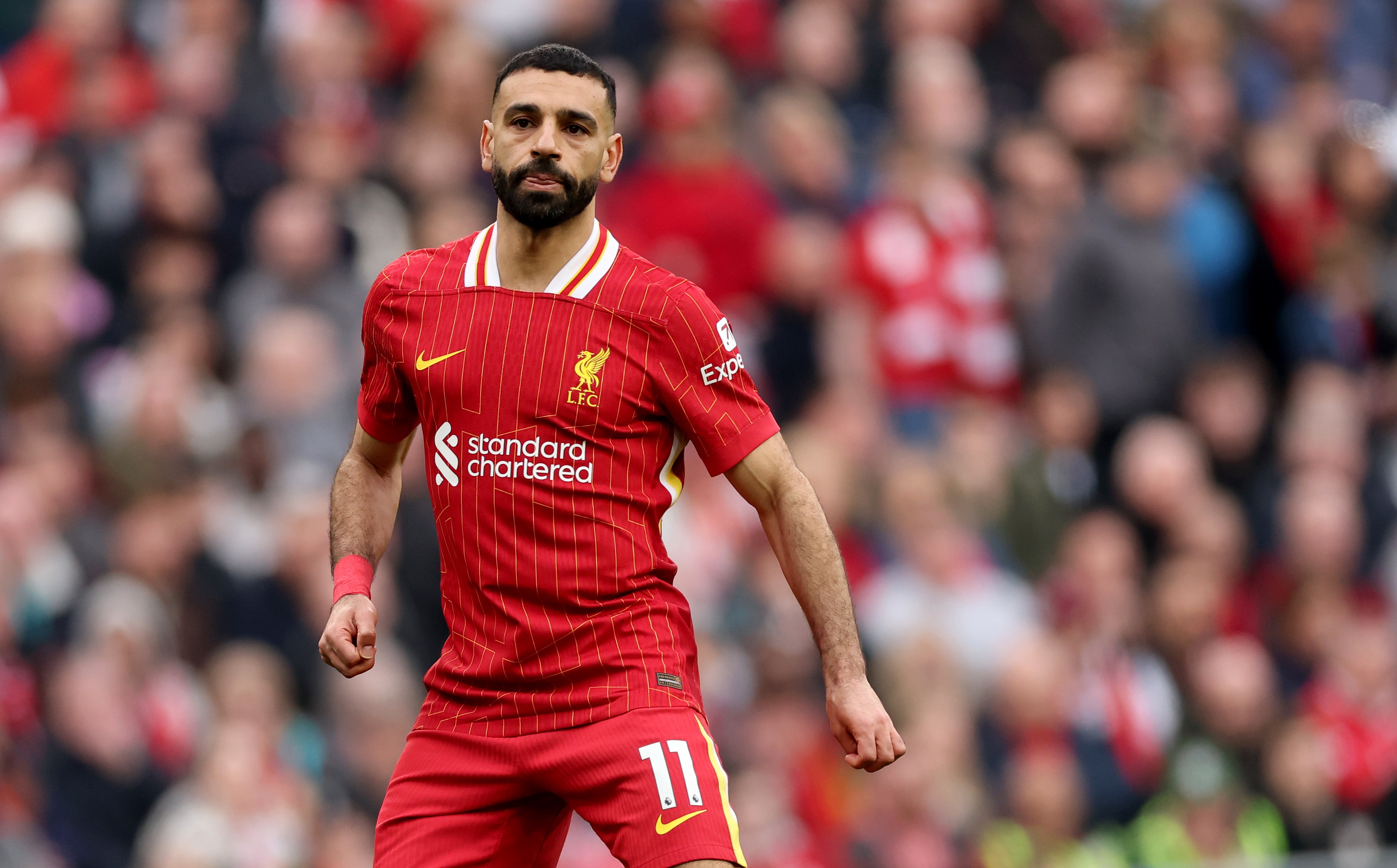 Liverpool forward Mo Salah runs at Anfield.