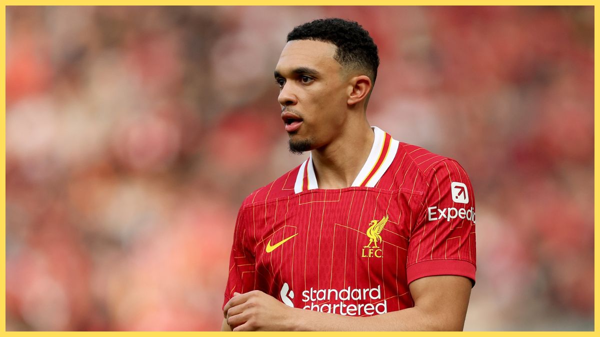 Trent Alexander-Arnold crosses one arm against his body.