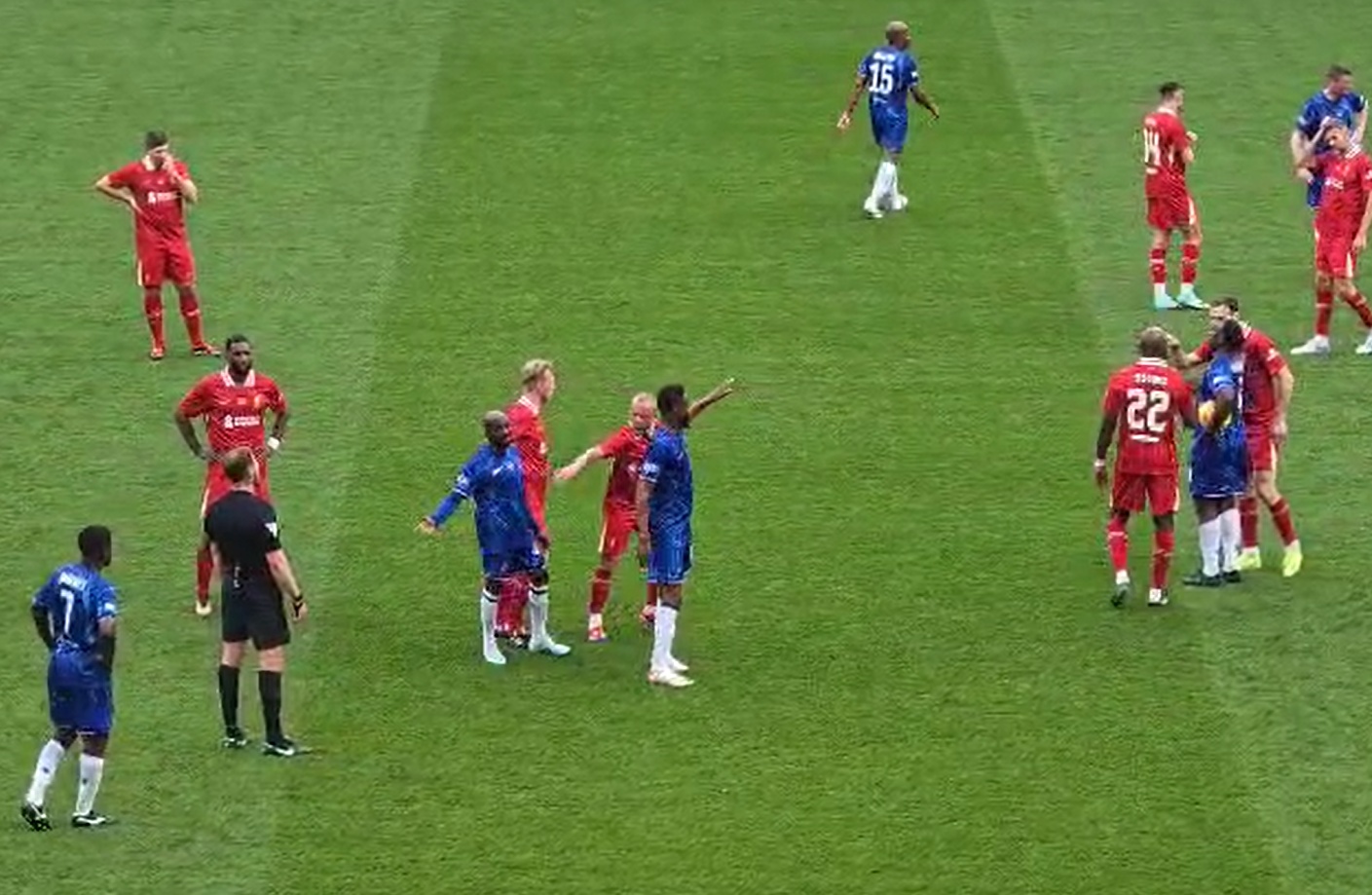 Jay Spearing exchanges words with Claude Makelele during the Legends match