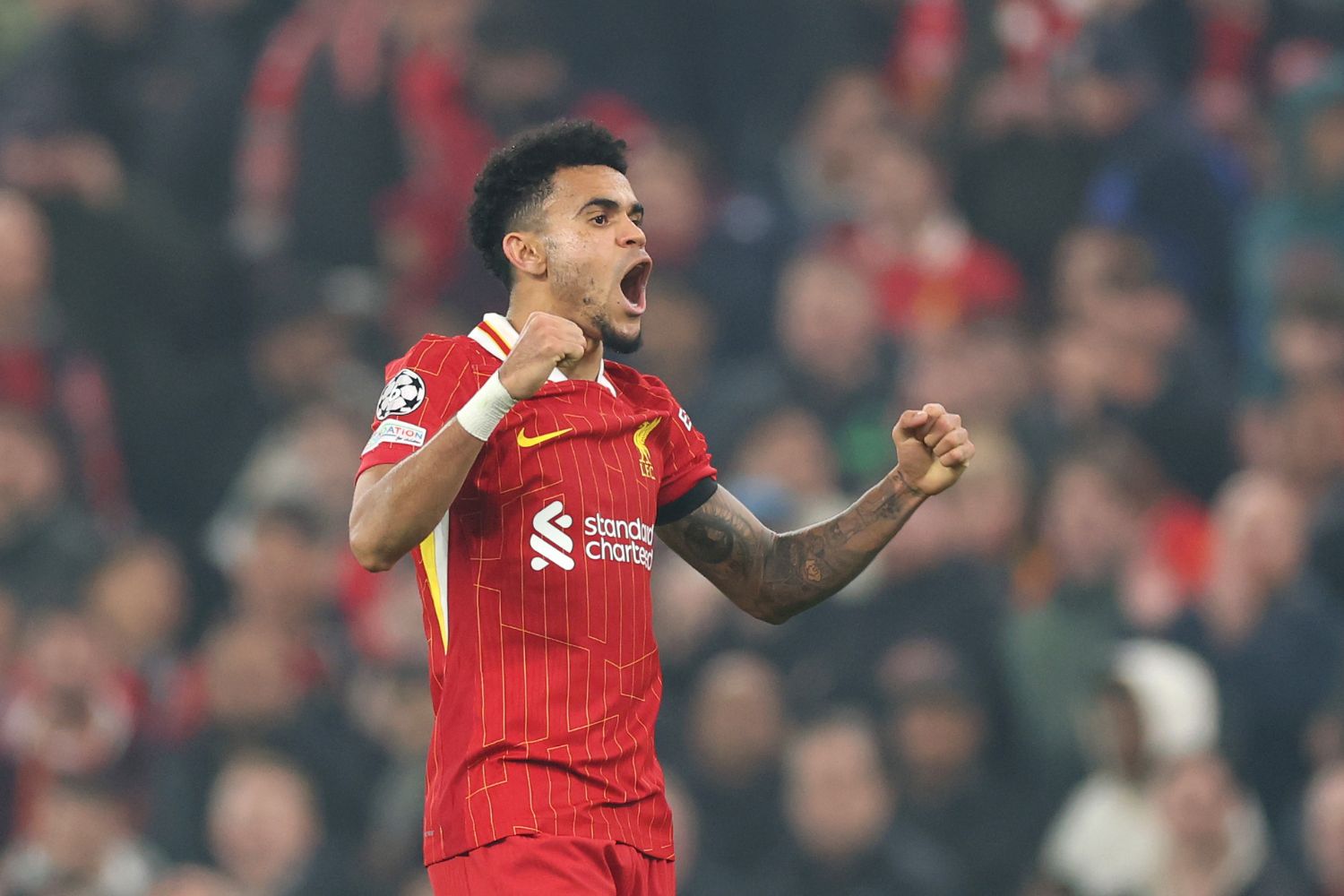 Luis Diaz celebrates with Liverpool fans