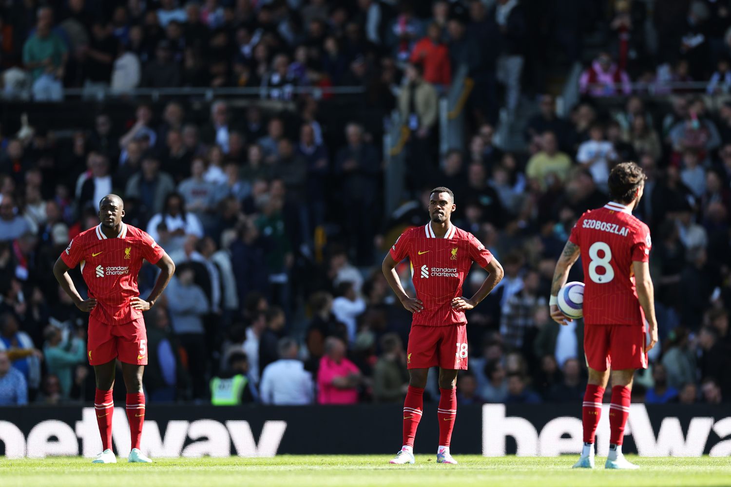 Liverpool players after conceding against Fulham
