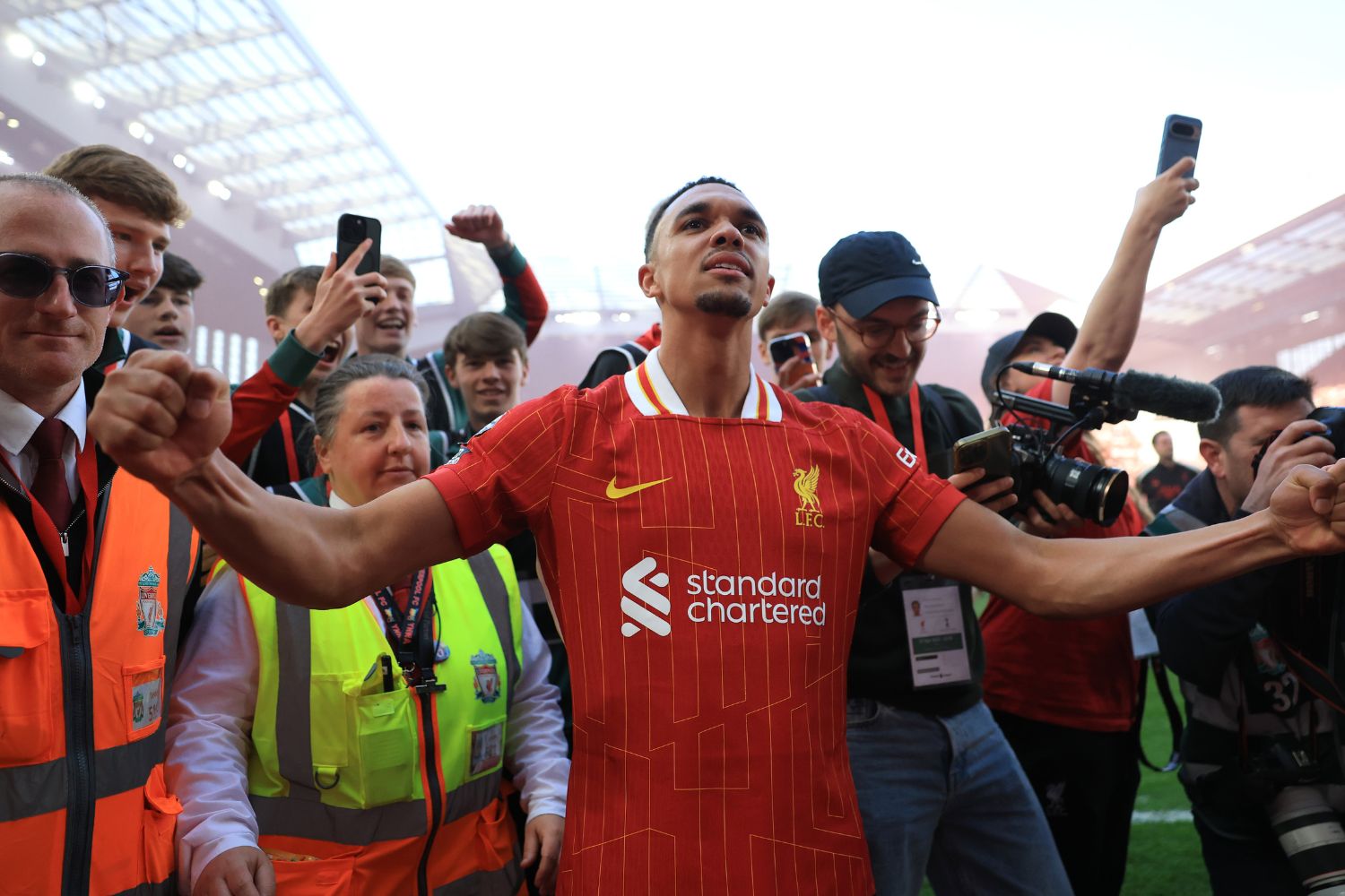 Trent Alexander-Arnold celebrates winning the league