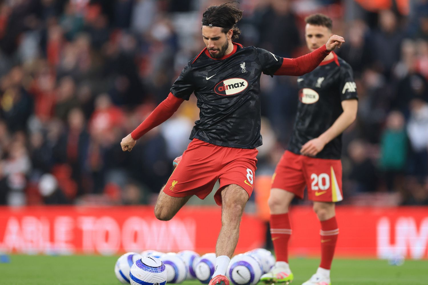 Dominik Szoboszlai warming up before playing Everton
