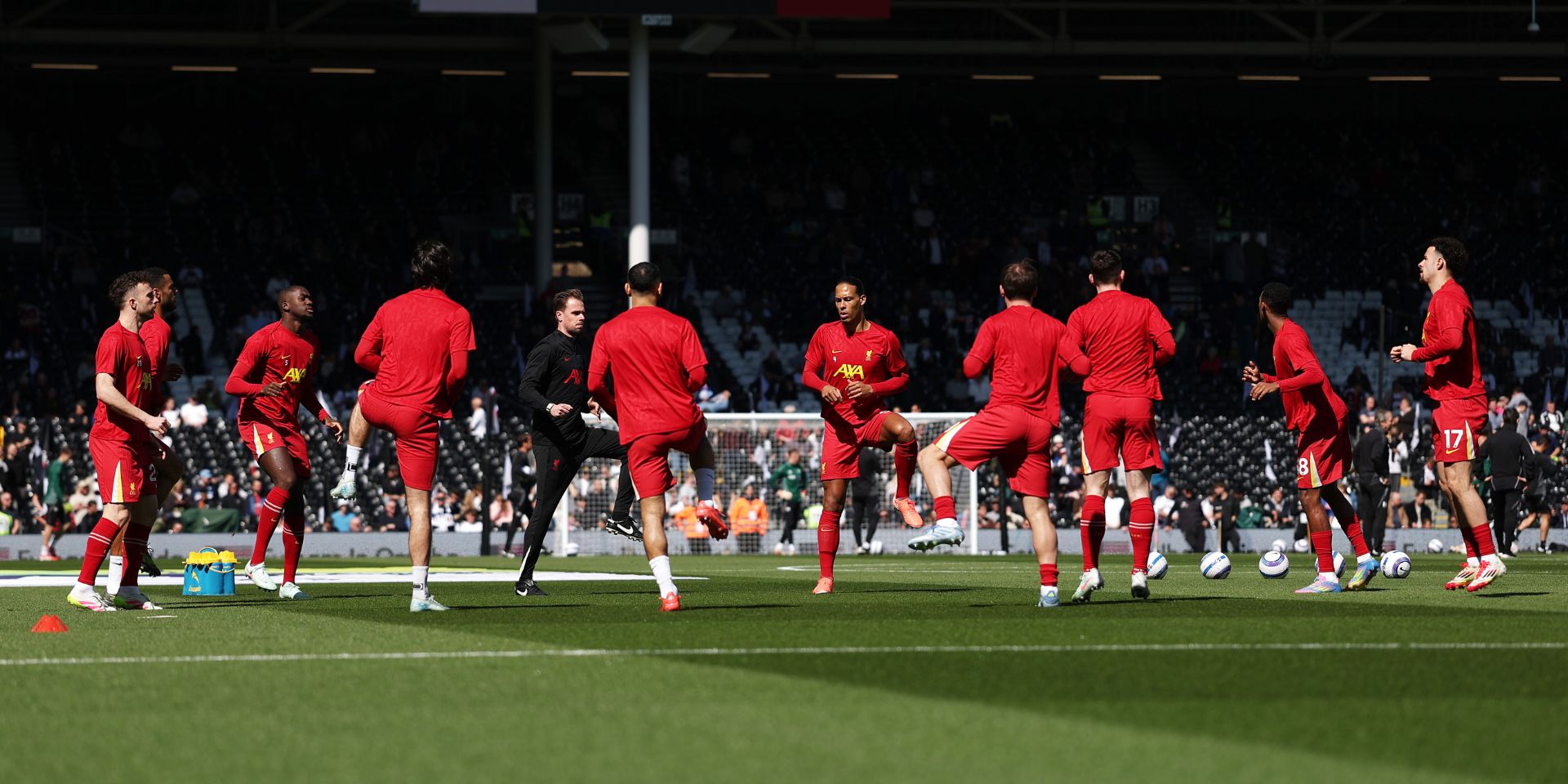 Virgil van Dijk warms up with the Liverpool squad