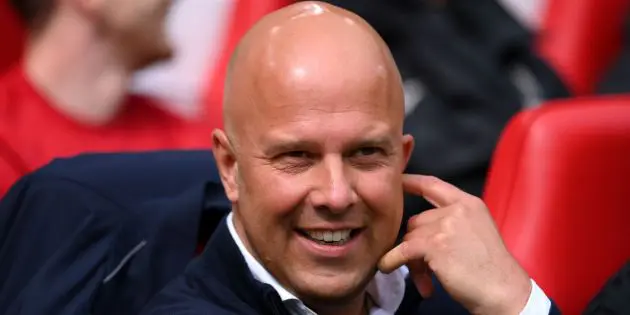 Arne Slot watches Liverpool from the bench at Anfield