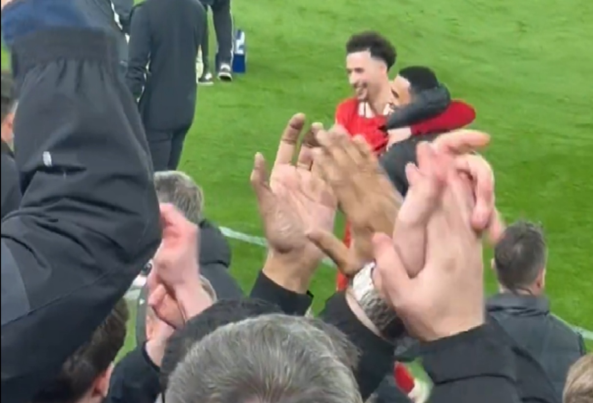 Curtis Jones celebrates with Trent Alexander-Arnold after Liverpool's win over Everton