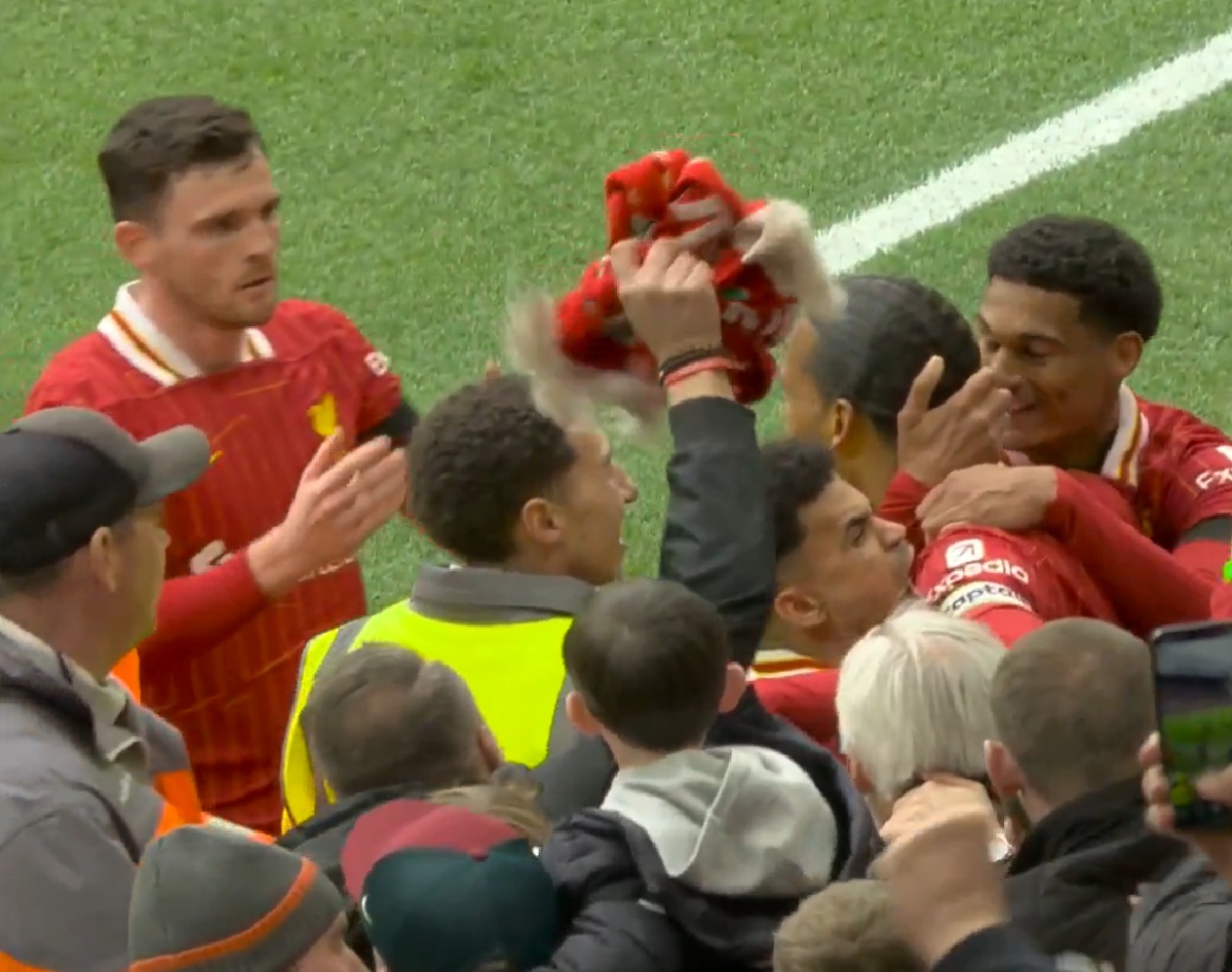 Andy Robertson appeared to kiss Virgil van Dijk after his late winner against West Ham