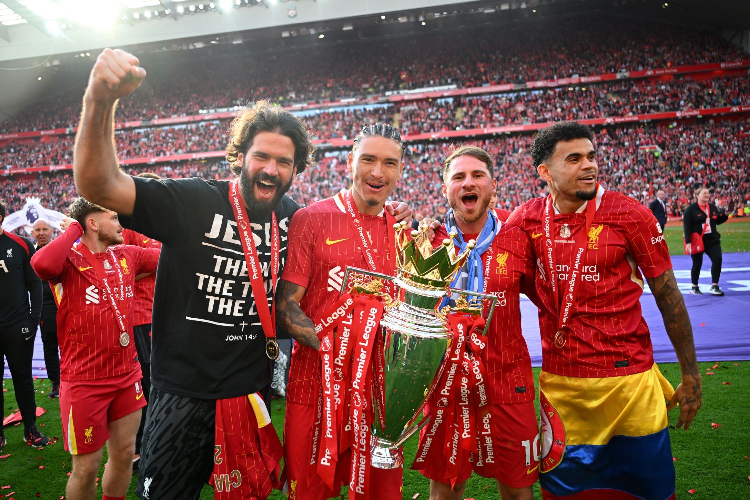 Luis Diaz and Darwin Nunez pose with the Premier League trophy
