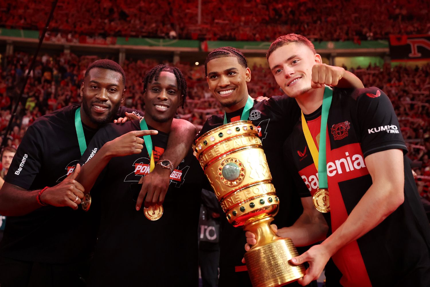 Florian Wirtz and Jeremie Frimpong celebrate for Leverkusen