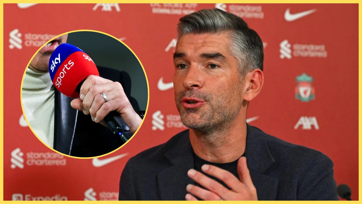 Liverpool sporting director Richard Hughes gestures with his hand next to Sky Sports microphone.