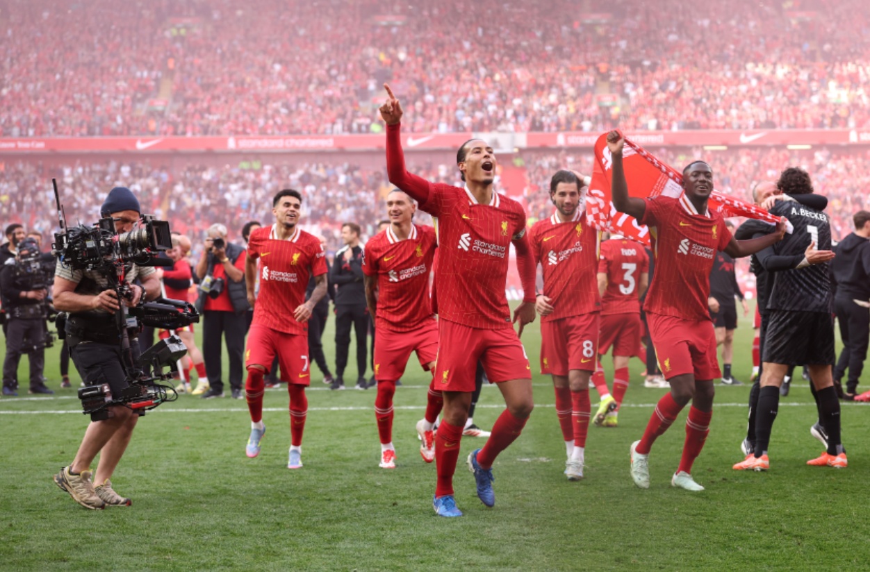 Liverpool players celebrate after clinching the Premier League title last Sunday