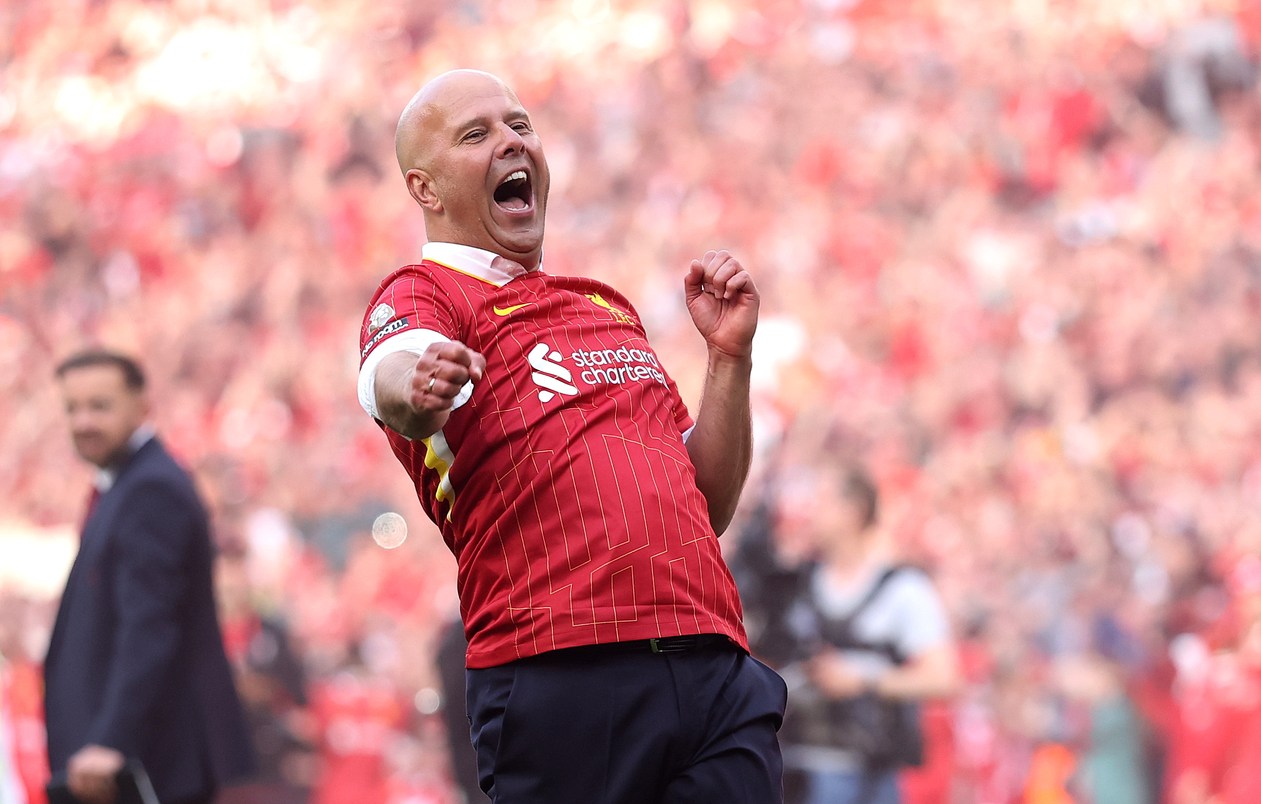 Arne Slot celebrates winning the Premier League title after Liverpool's win over Tottenham