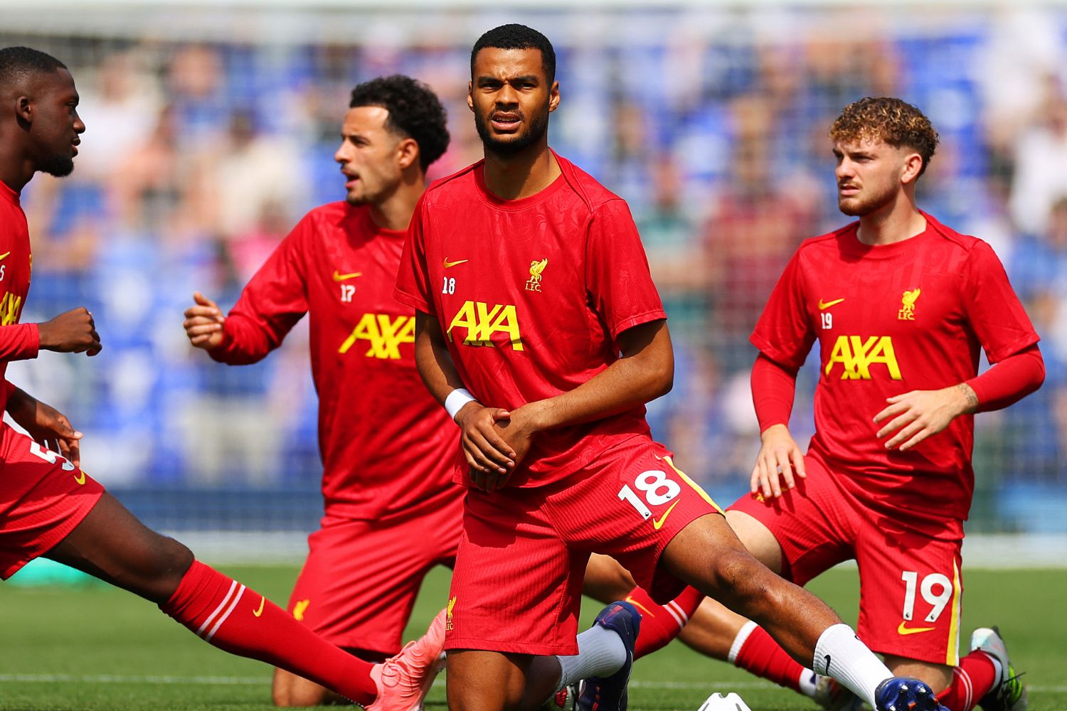 Curtis Jones and Harvey Elliott warm up for Liverpool