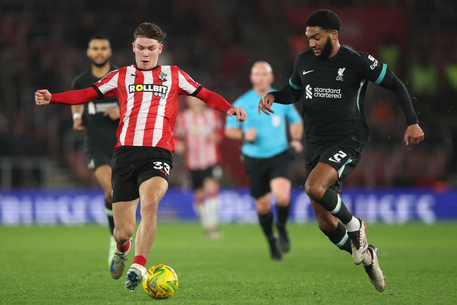 Tyler Dibling competes for the ball with Joe Gomez