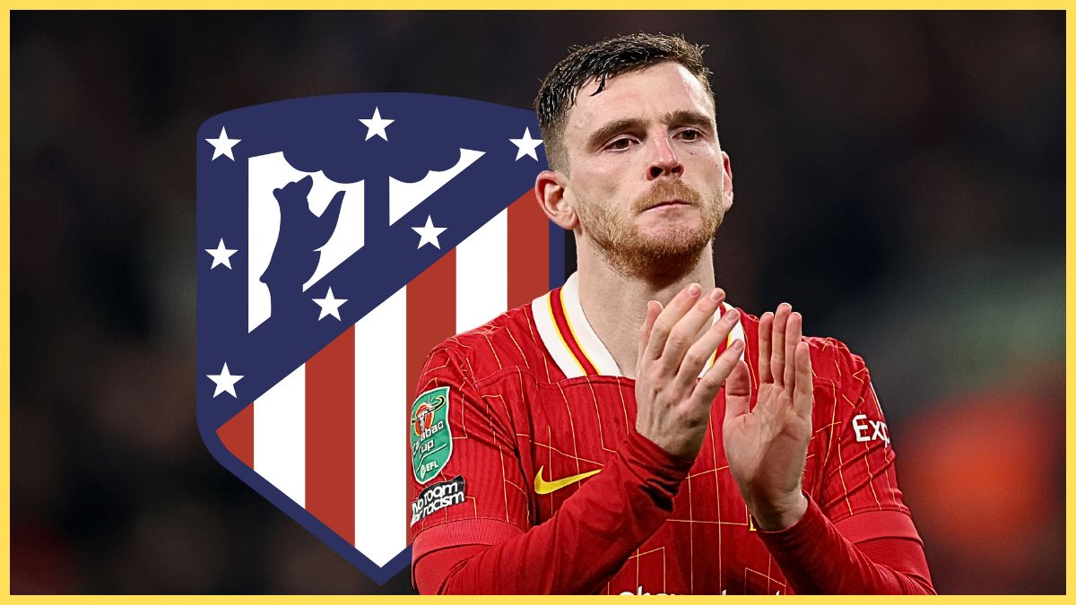 Andy Robertson looks glum and claps his hands in front of Atletico Madrid club crest.