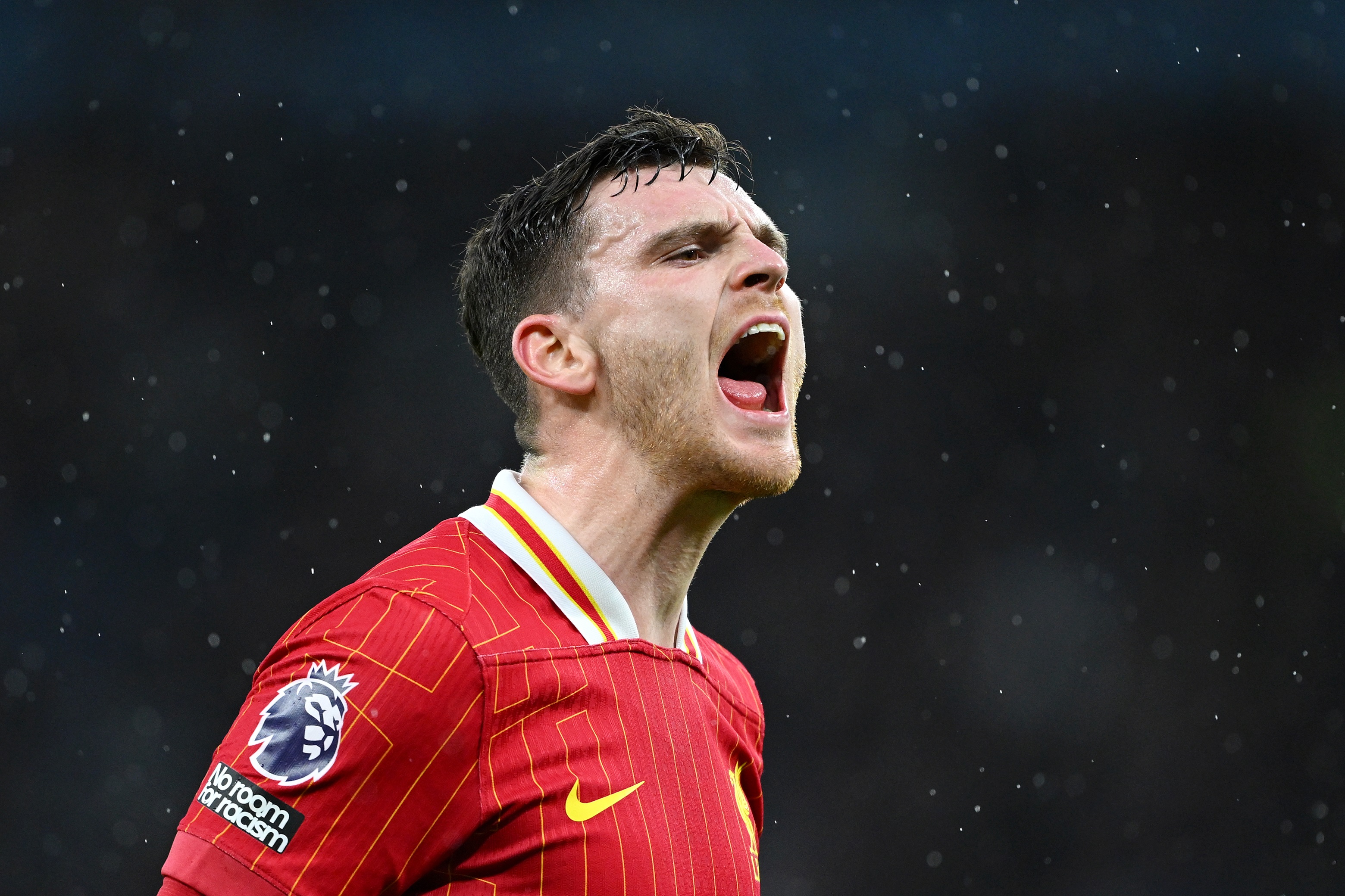 Andy Robertson shouts during Liverpool game.