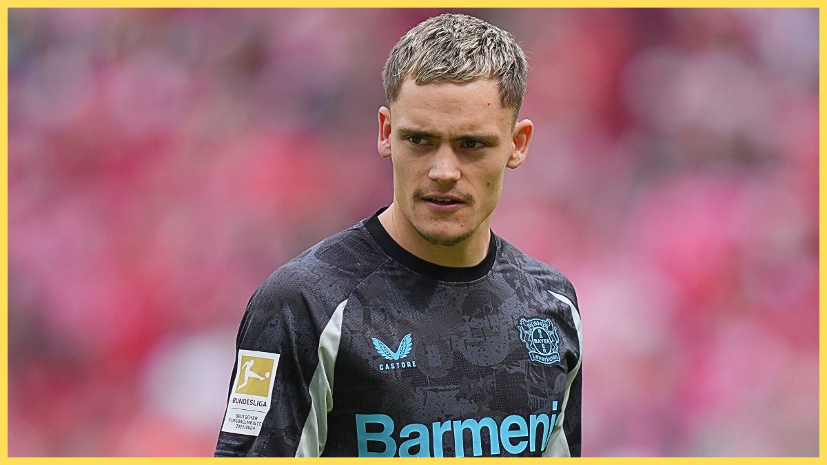 Florian Wirtz looks on during Leverkusen match.