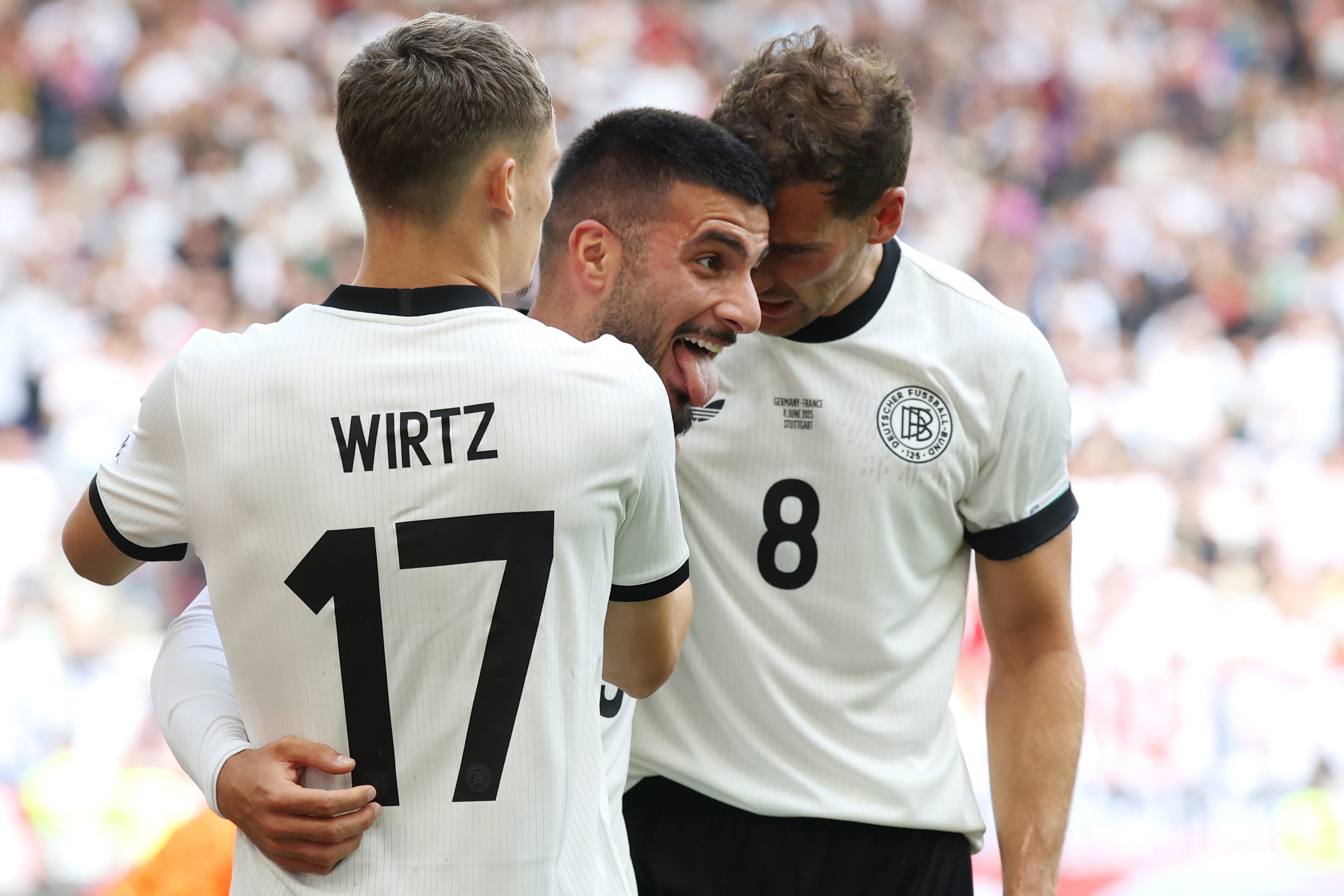 Florian Wirtz celebrates with Germany teammates.