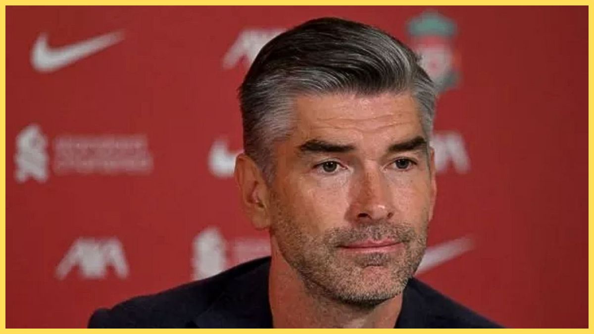 Richard Hughes looks on during Liverpool press conference.