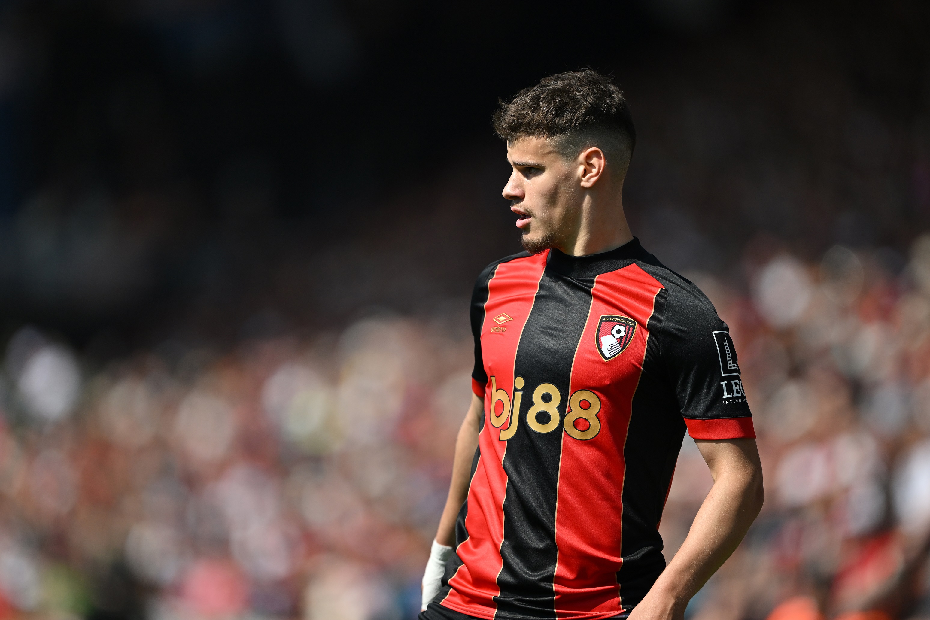 Milos Kerkez looks to his right during Bournemouth game.