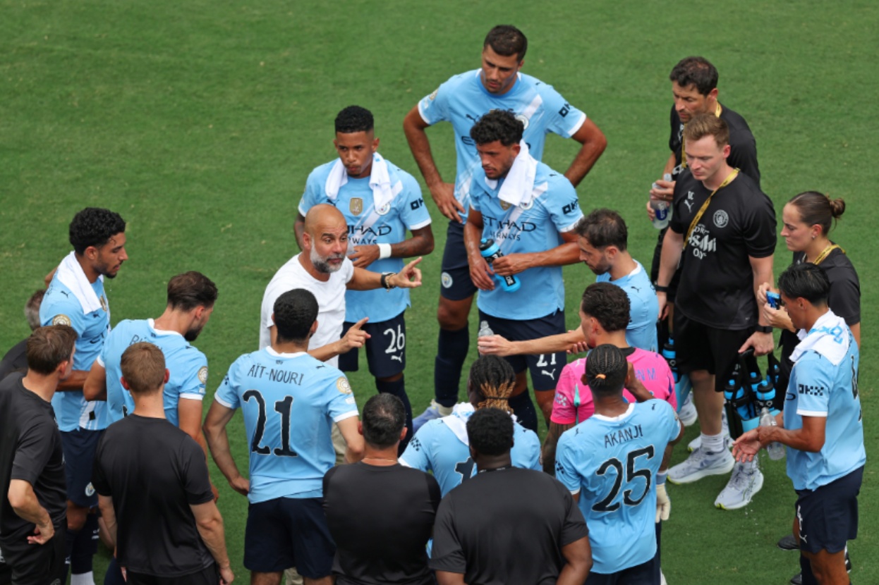 Pep Guardiola addresses his Man City players during the FIFA Club World Cup