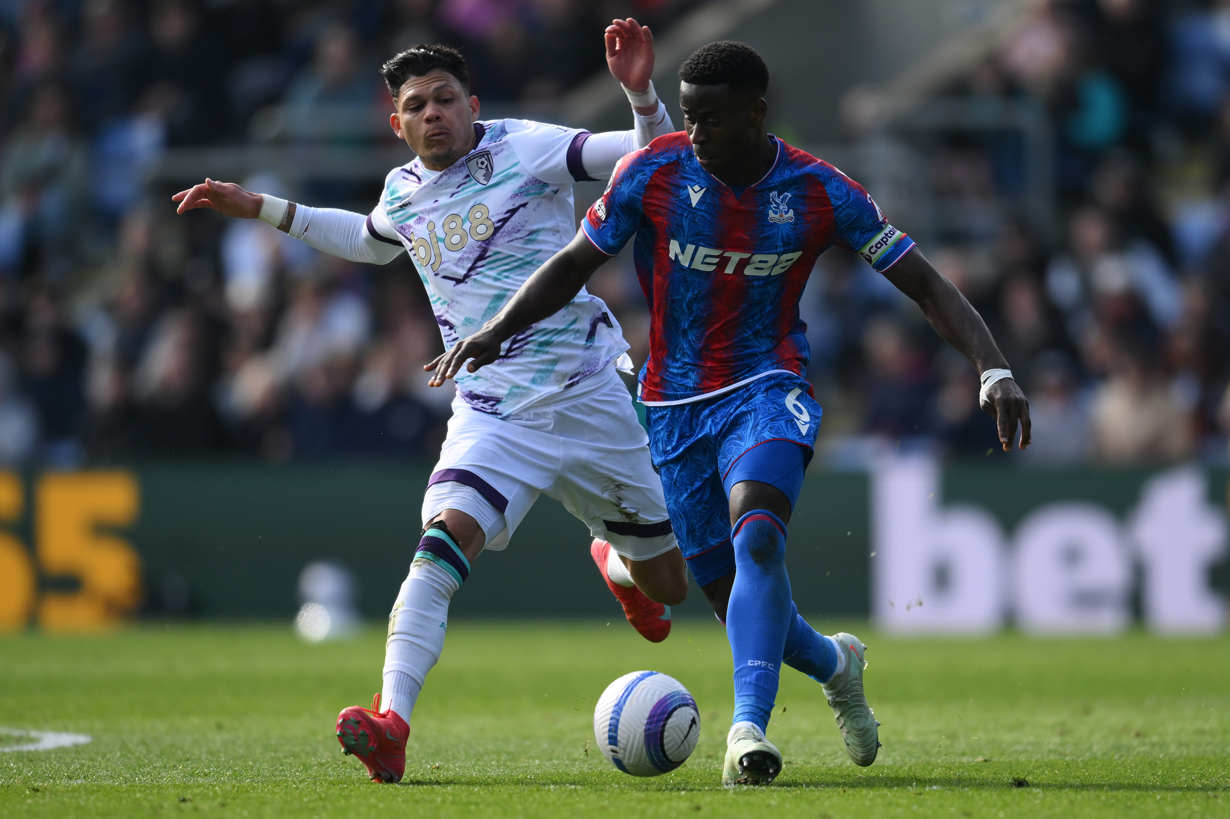 Liverpool are seemingly awaiting a 'signal' from Crystal Palace before launching a bid to sign Marc Guehi
