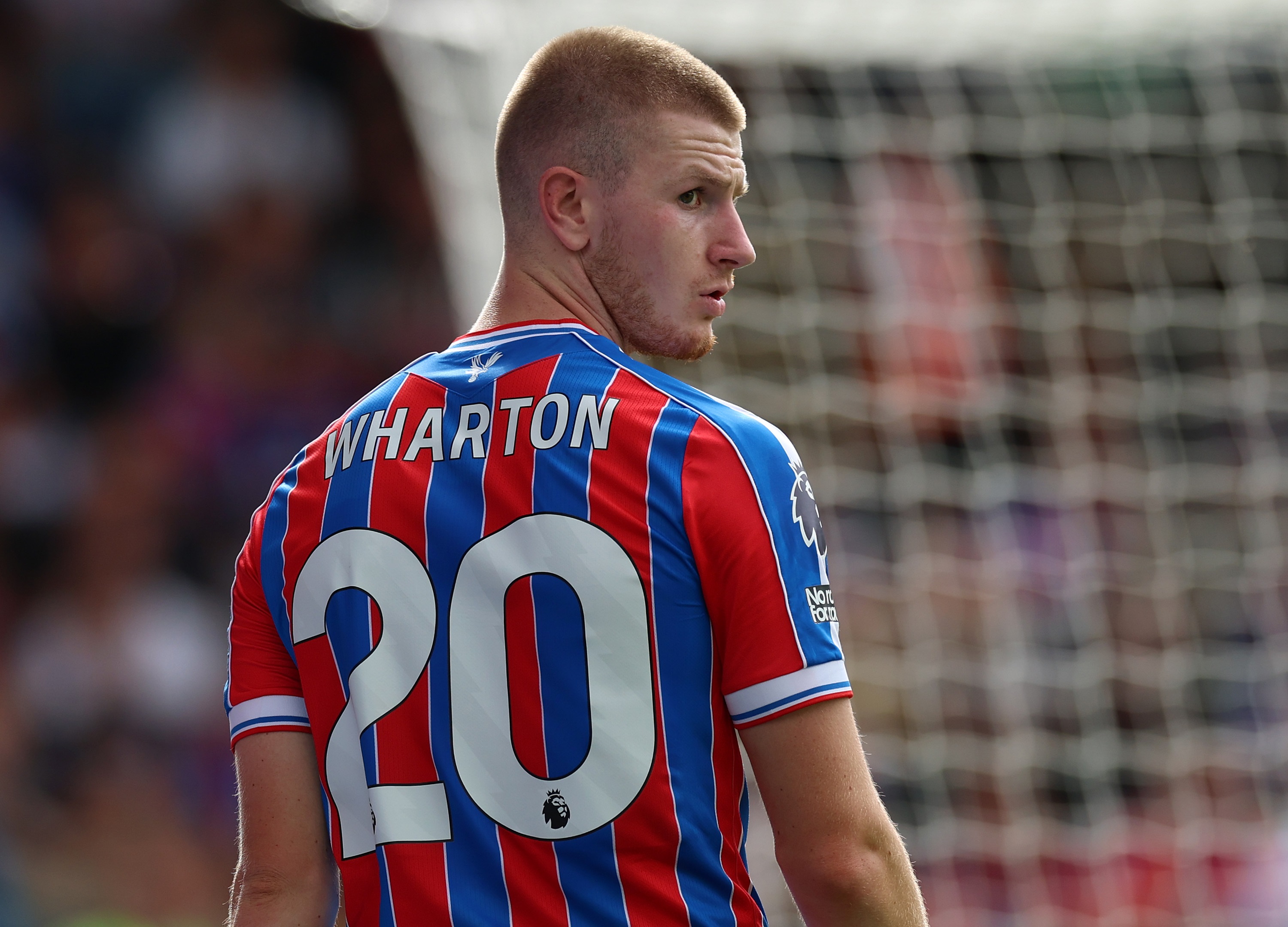 Adam Wharton looks over his shoulder during Crystal Palace game.