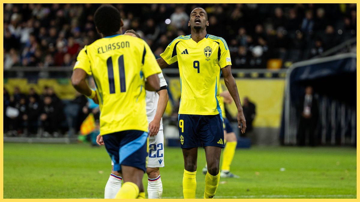 Alexander Isak holds his head up and looks dejected during Sweden game.