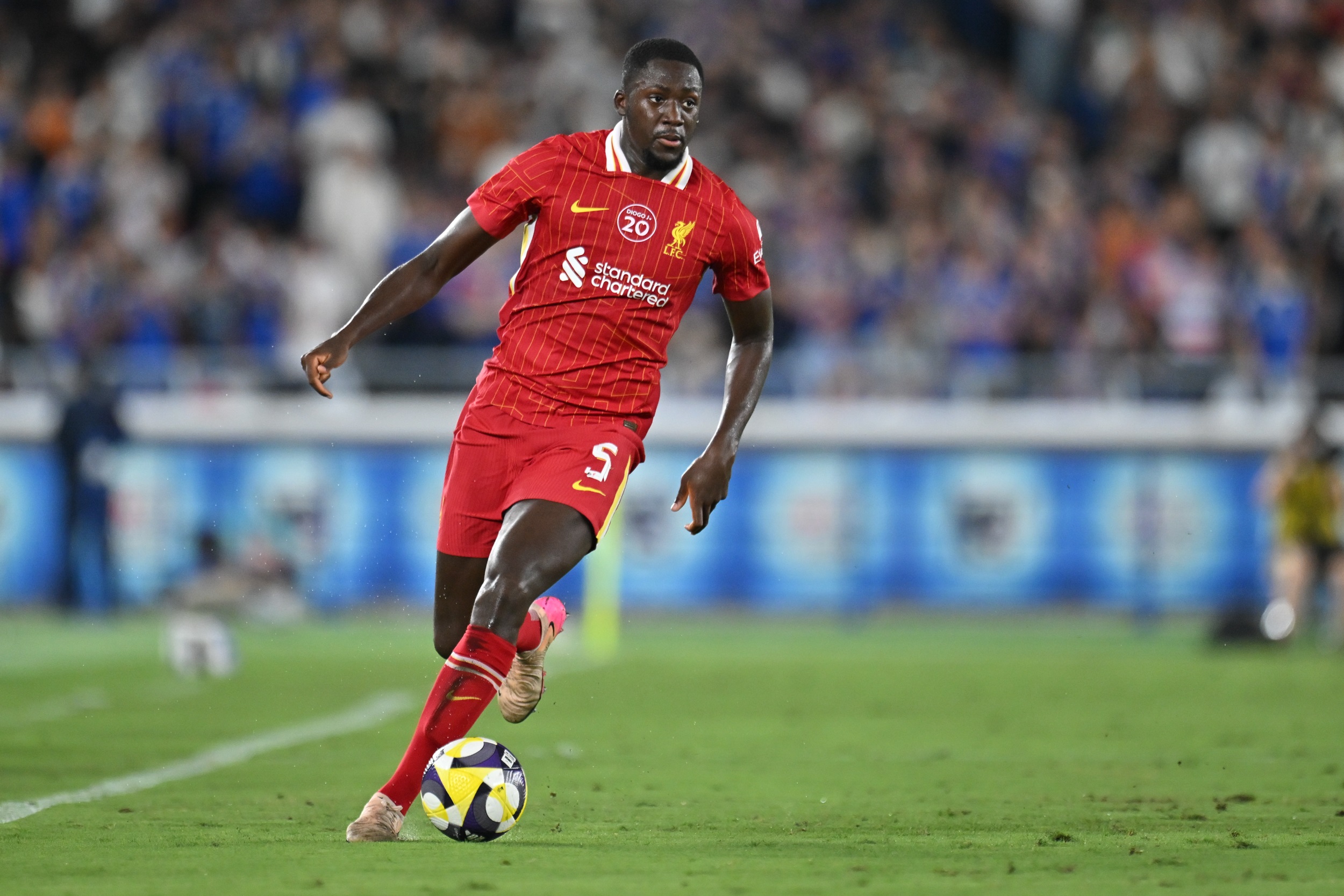 Ibrahima Konate dribbles with the ball during Liverpool game.
