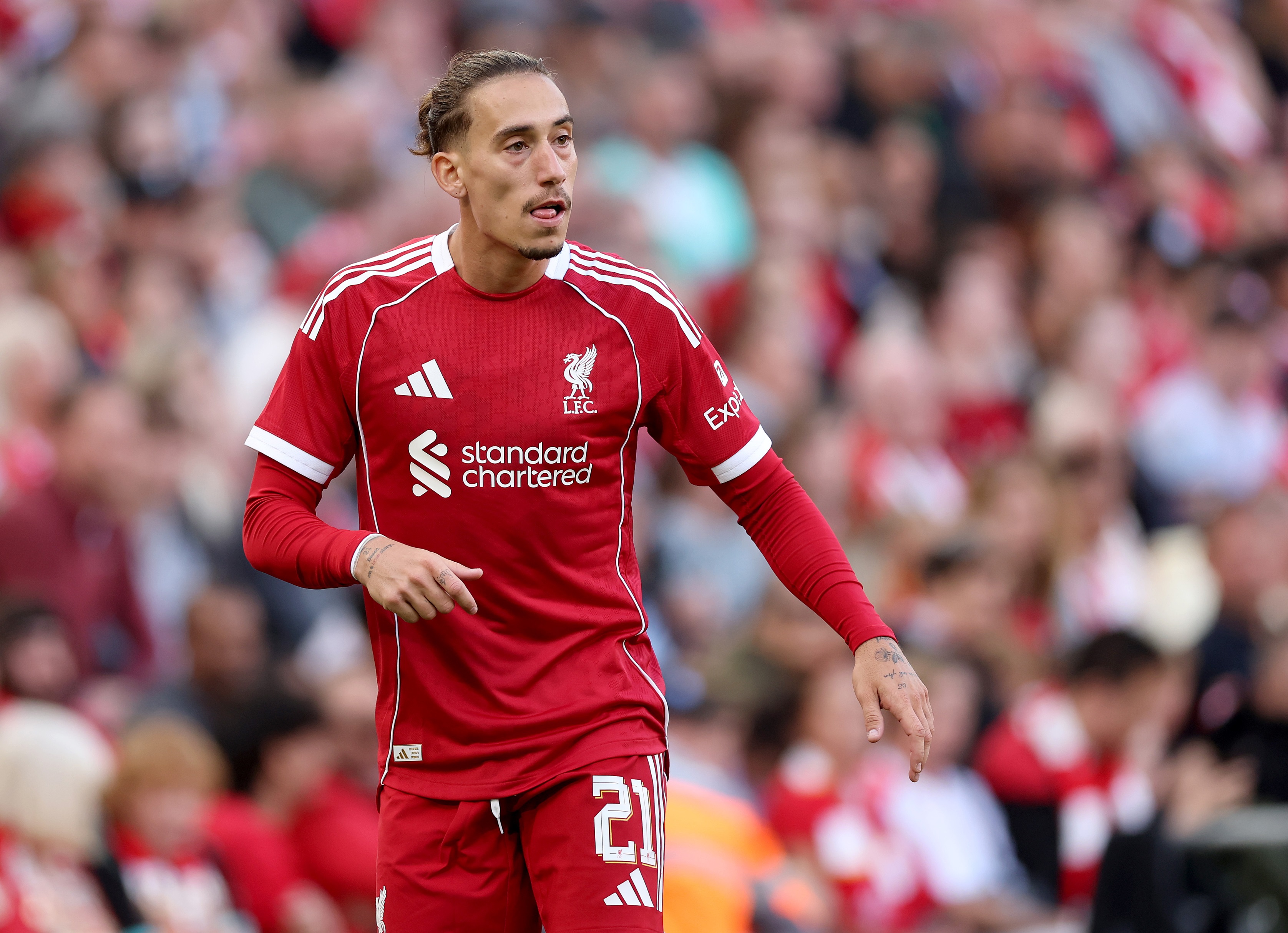 Kostas Tsimikas looks on during Liverpool game.