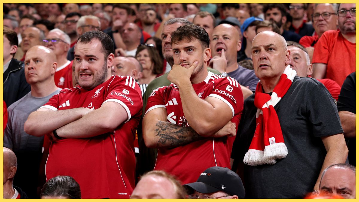 Liverpool fans look nervous as they watch game against Bournemouth from the stands.