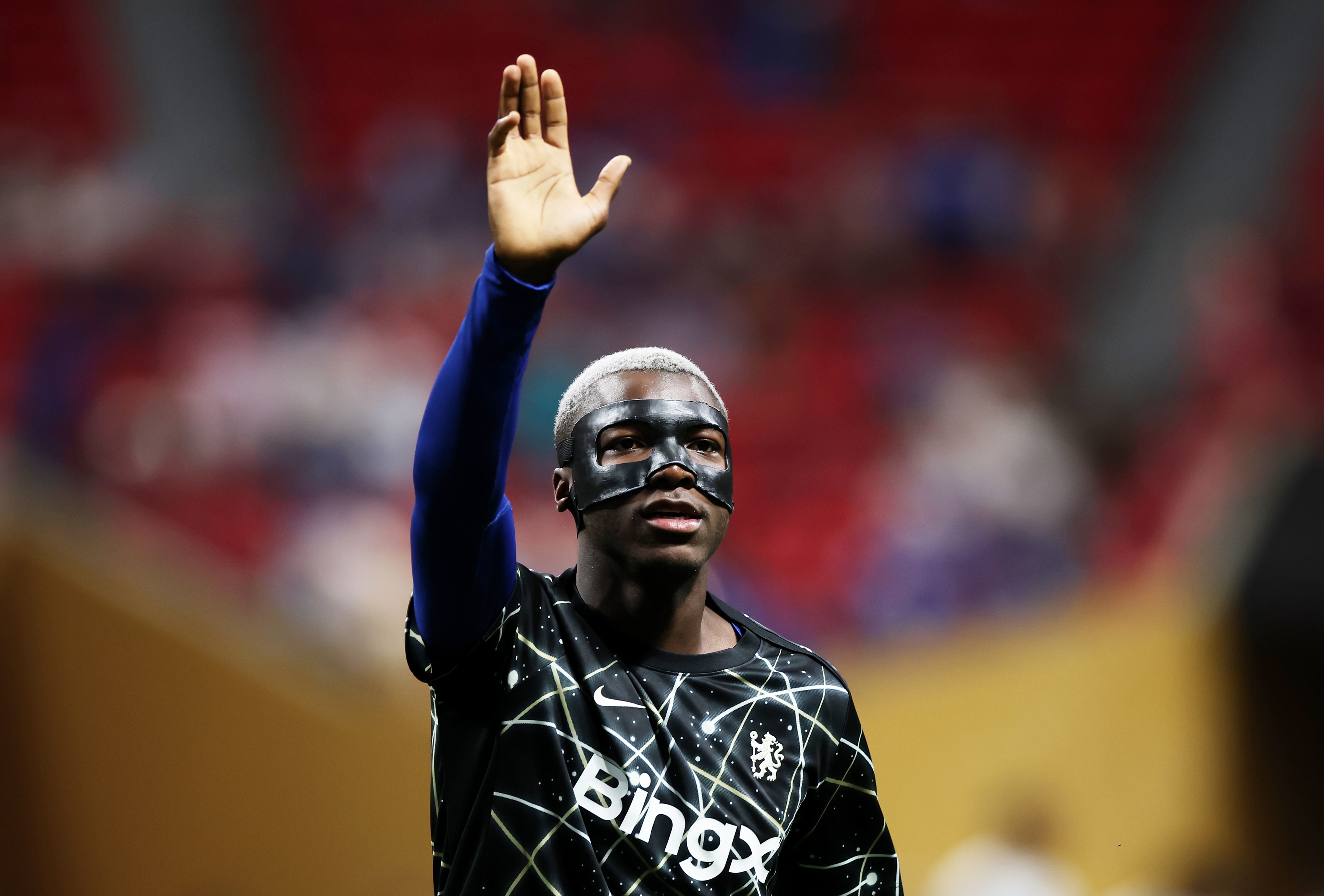 Nicolas Jackson holds up his hand during Chelsea game.