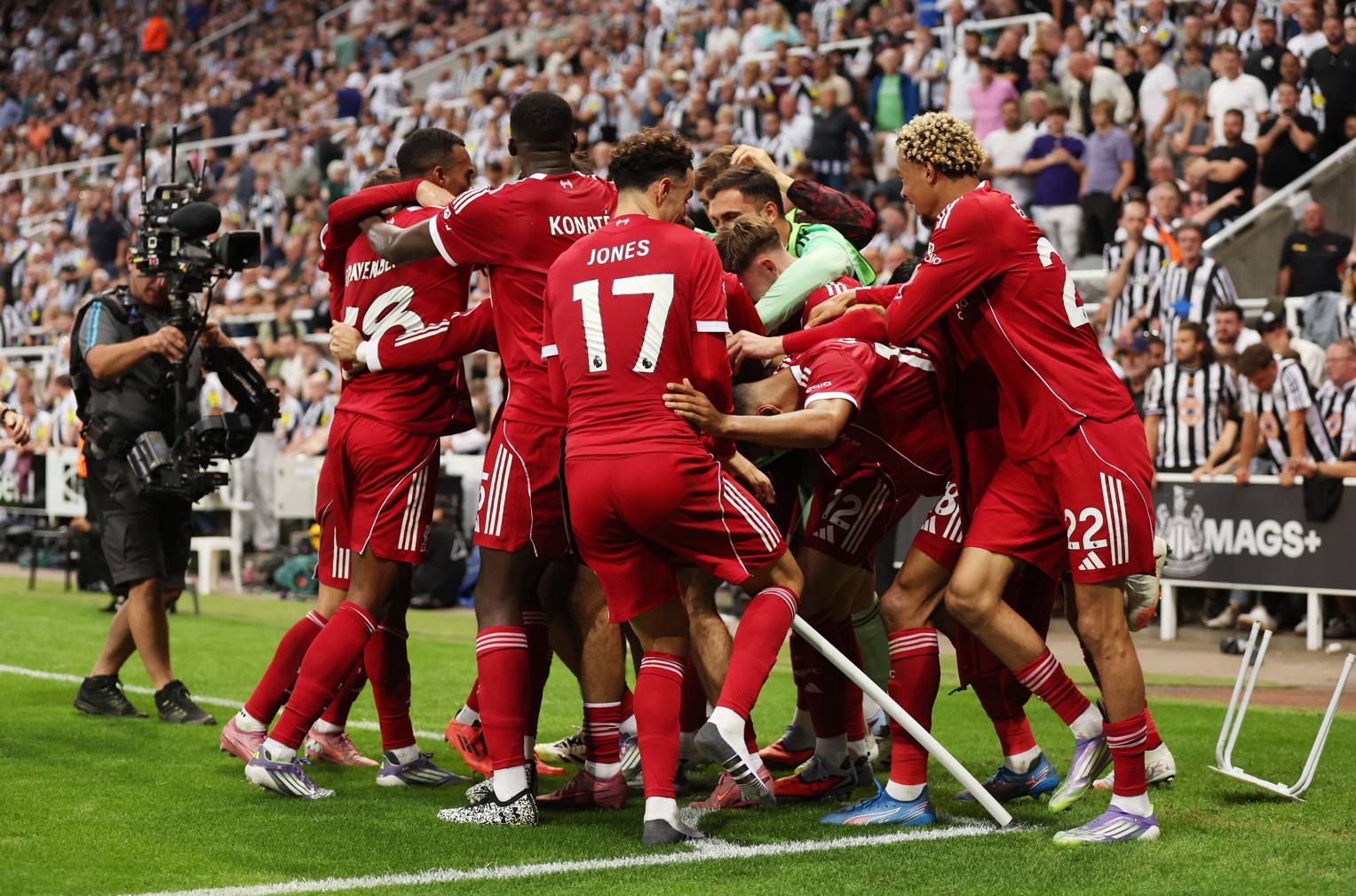 Rio Ngumoha is mobbed after scoring Liverpool's last-gasp winner against Newcastle