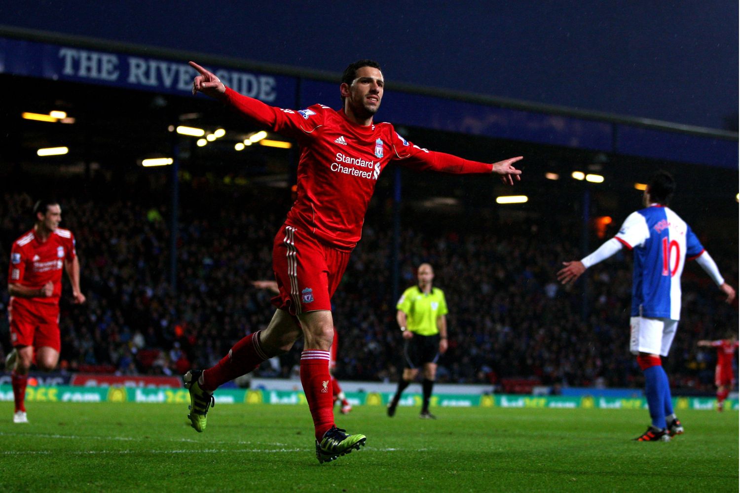 Maxi Rodriguez celebrates scoring for Liverpool
