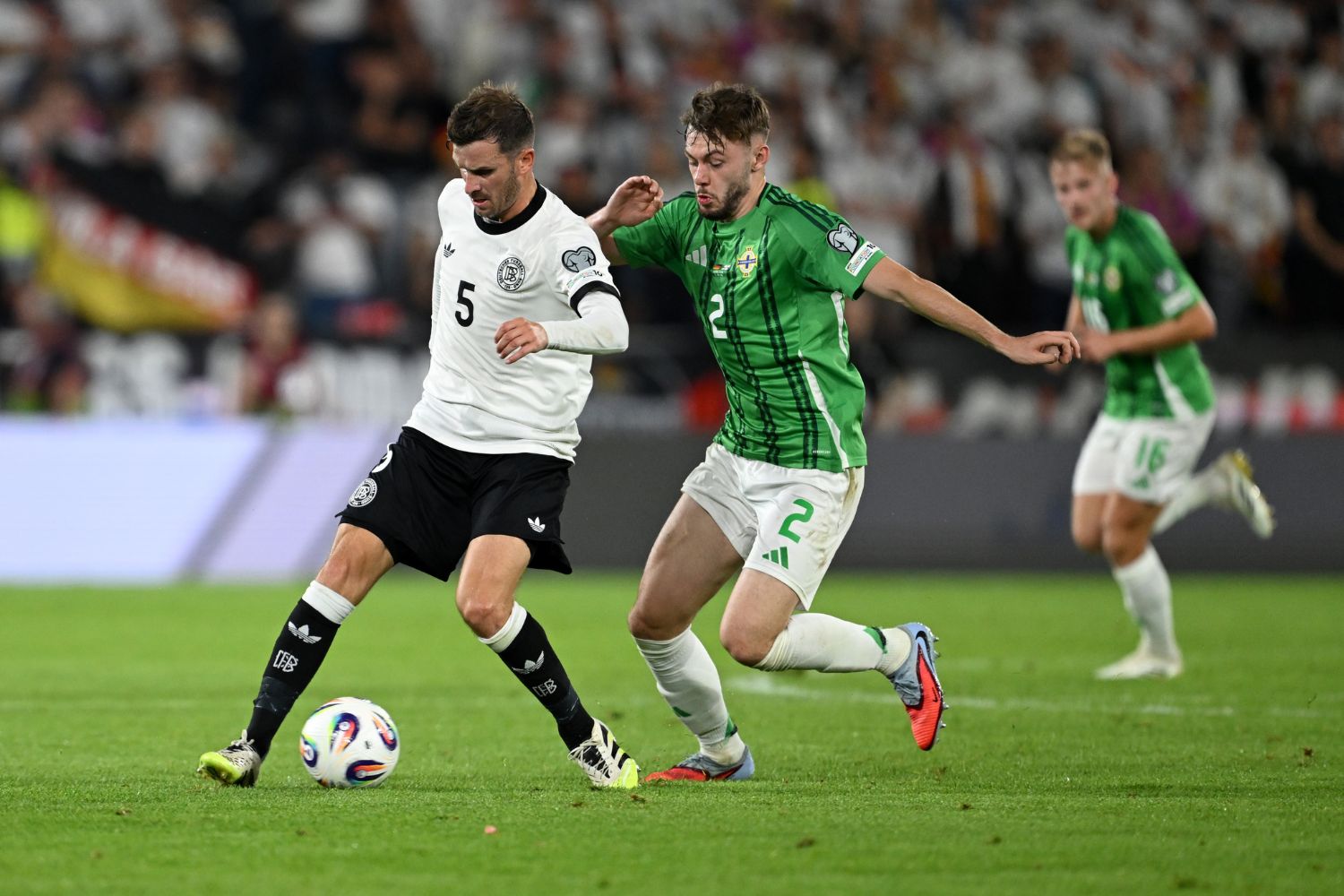 Conor Bradley plays against Germany for Northern Ireland