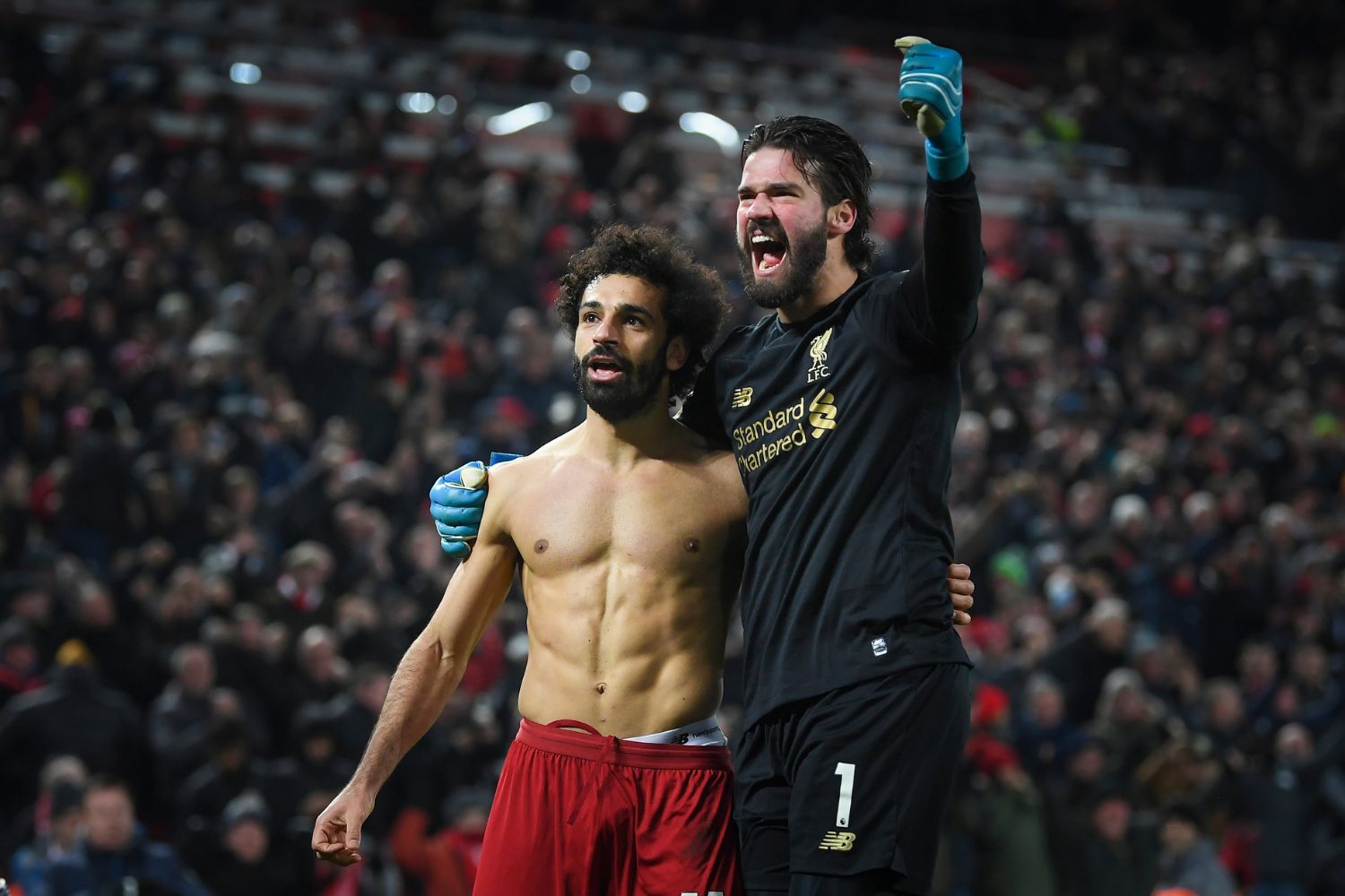 Alisson Becker and Mo Salah celebrate for Liverpool in 2020