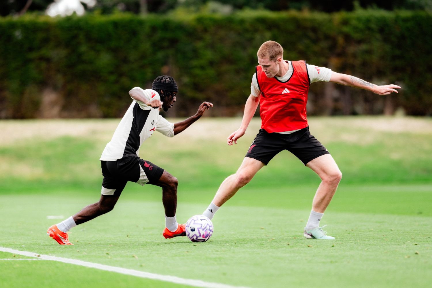 Jeremie Frimpong and Carter Pinnington in Liverpool training