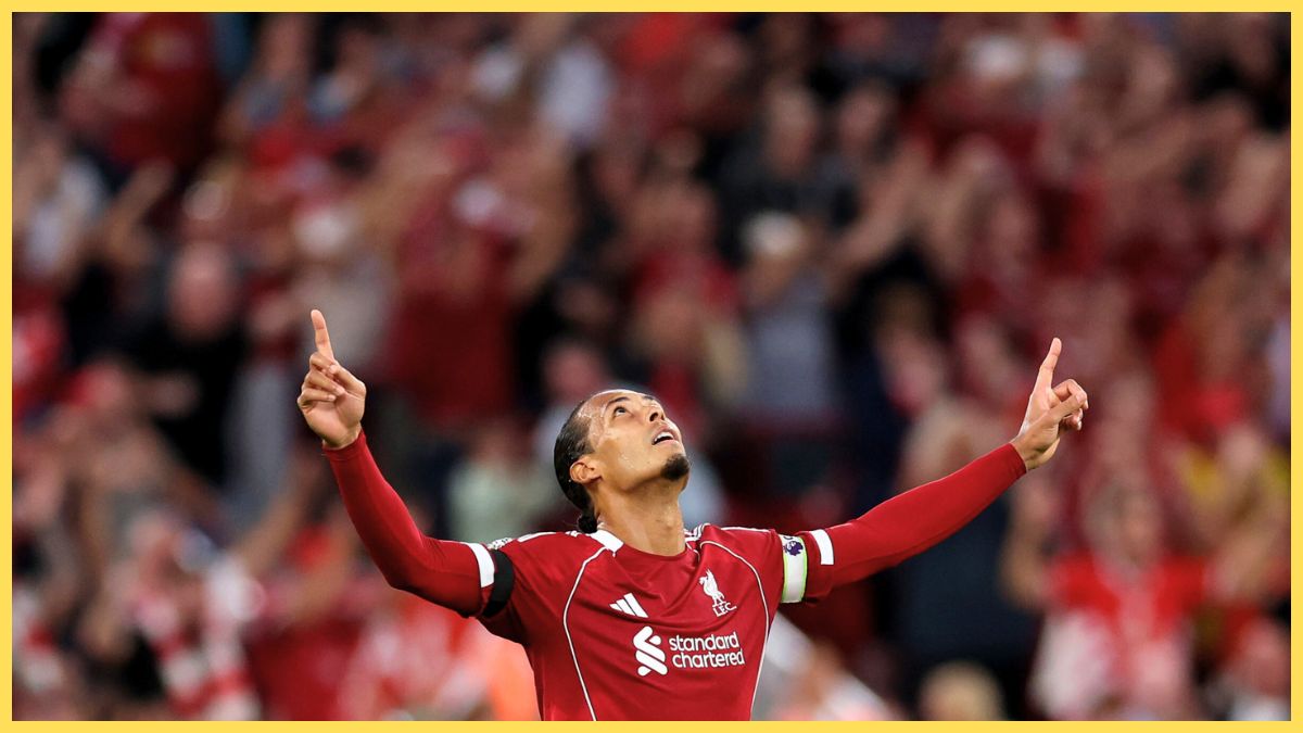 Virgil van Dijk celebrates at Anfield