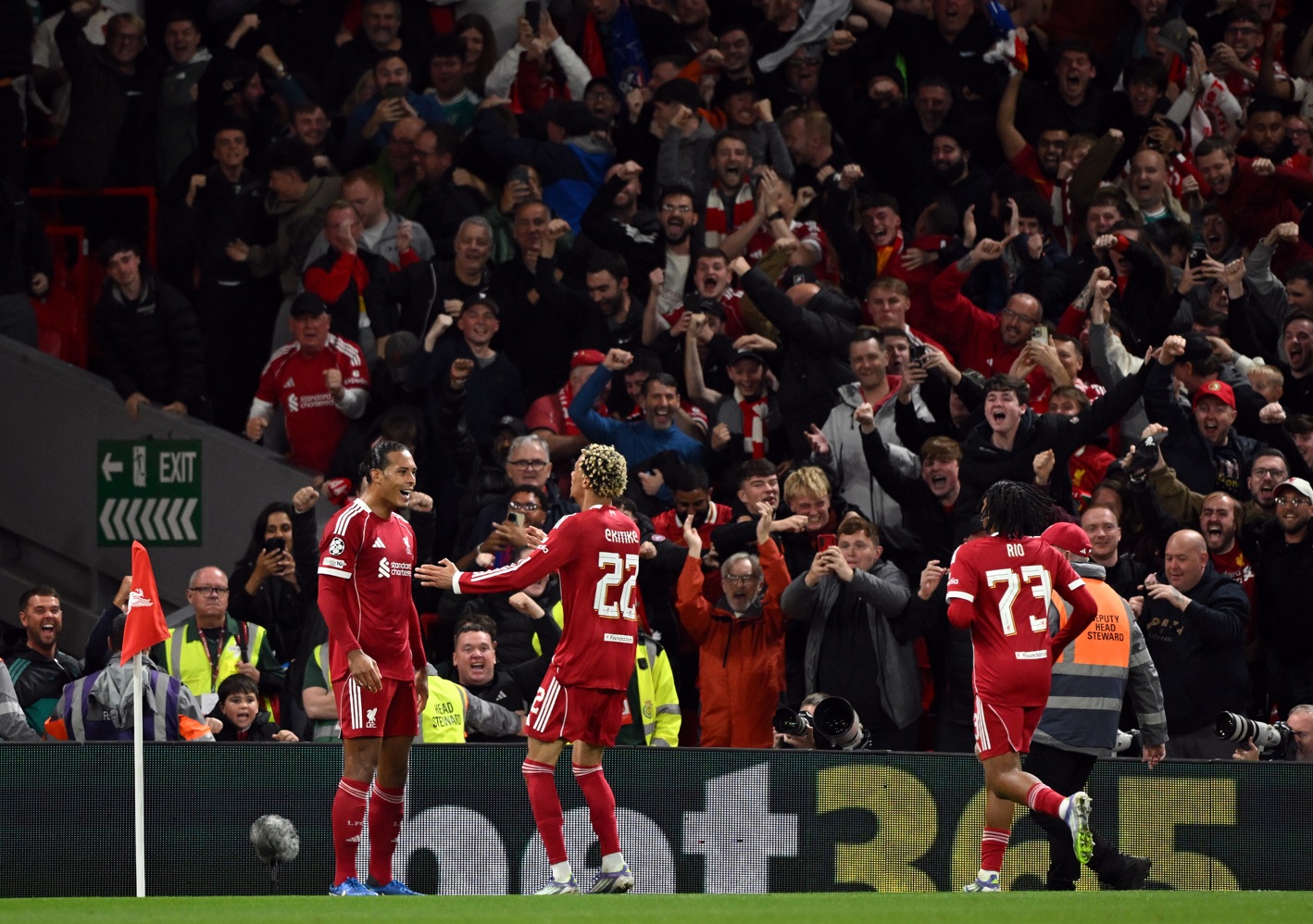 Virgil van Dijk celebrates his stoppage time winner against Atletico Madrid