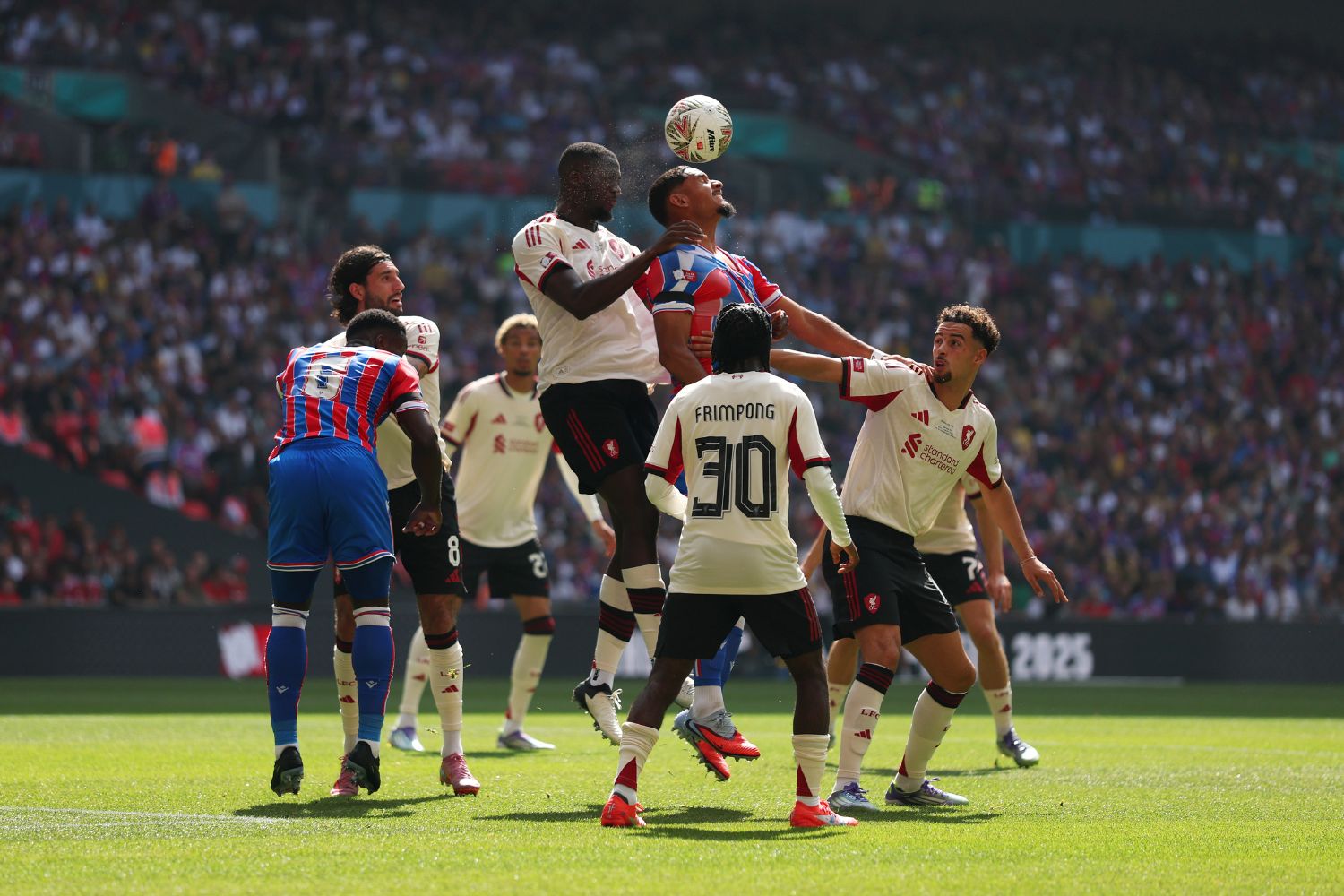 Ibou Konate of Liverpool and Maxence Lacroix of Crystal Palace battle for a header