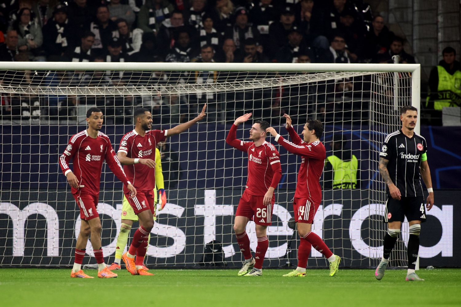 Andy Robertson, Federico Chiesa, Cody Gakpo and Hugo Ekitike celebrate against Eintracht Frankfurt