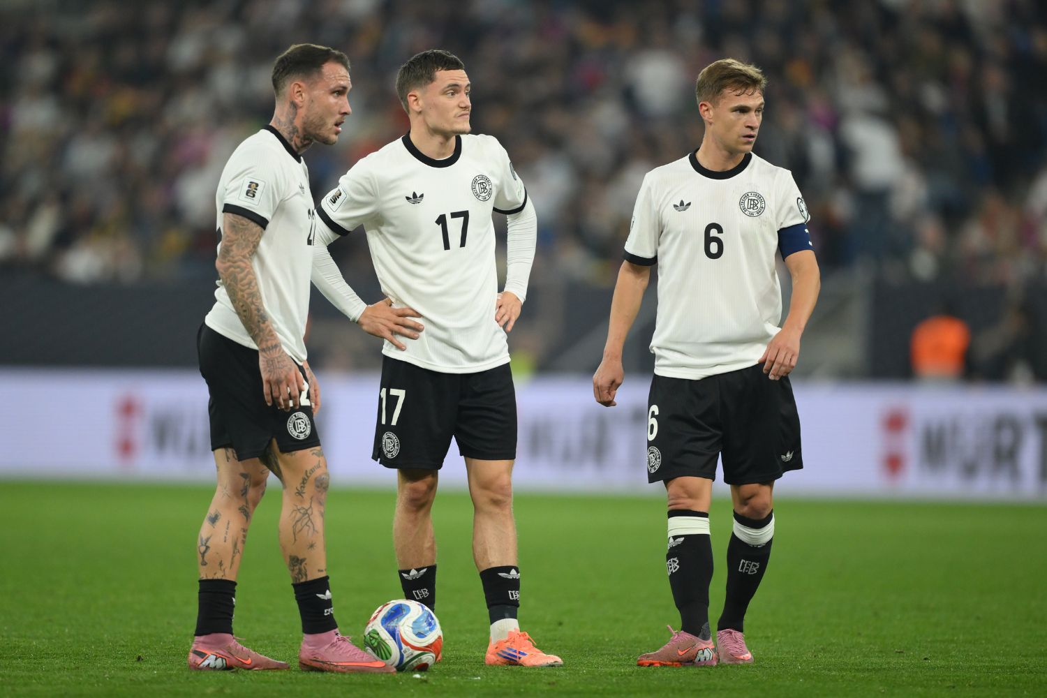 David Raum, Florian Wirtz and Joshua Kimmich of Germany