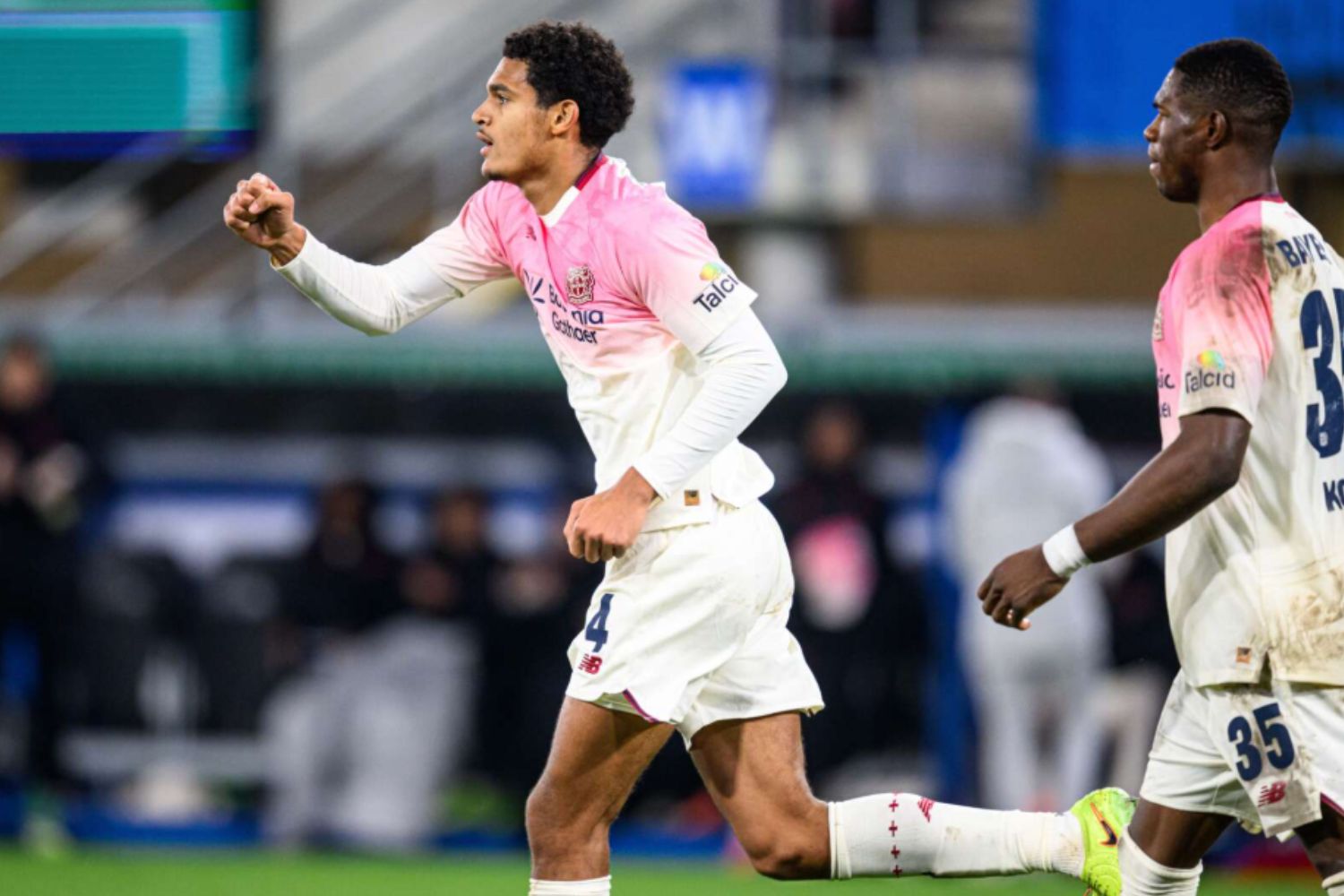 Jarell Quansah celebrates scoring for Bayer Leverkusen