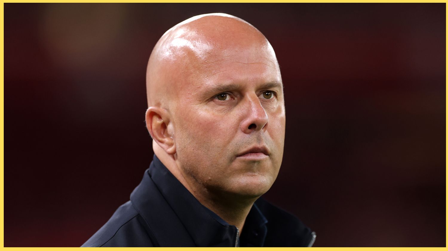 Arne Slot looks on during Liverpool game.