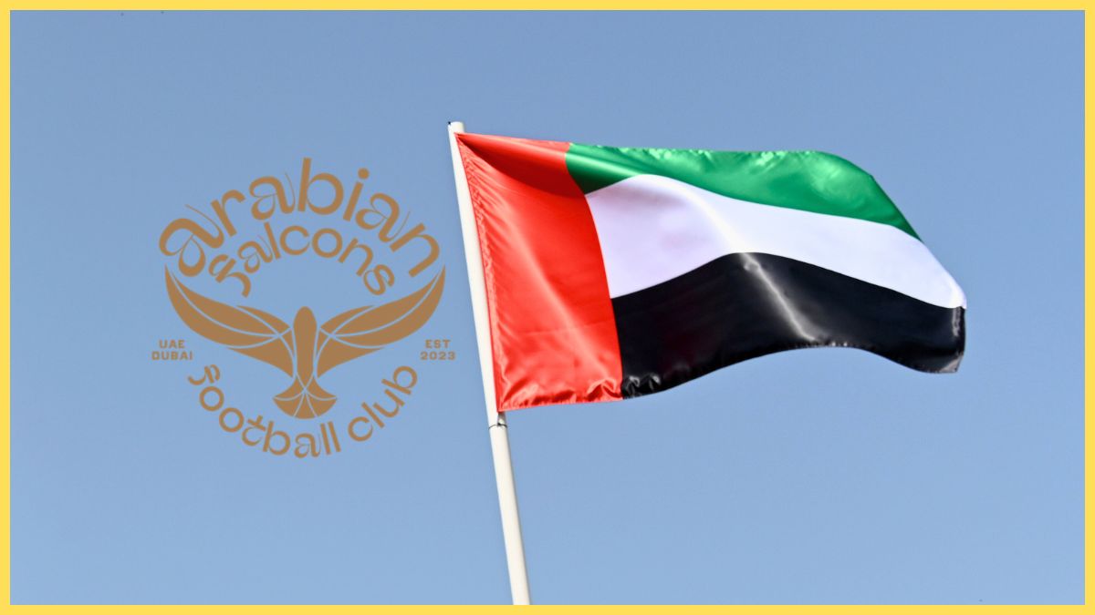 Dubai flag flying with Arabian Falcons logo
