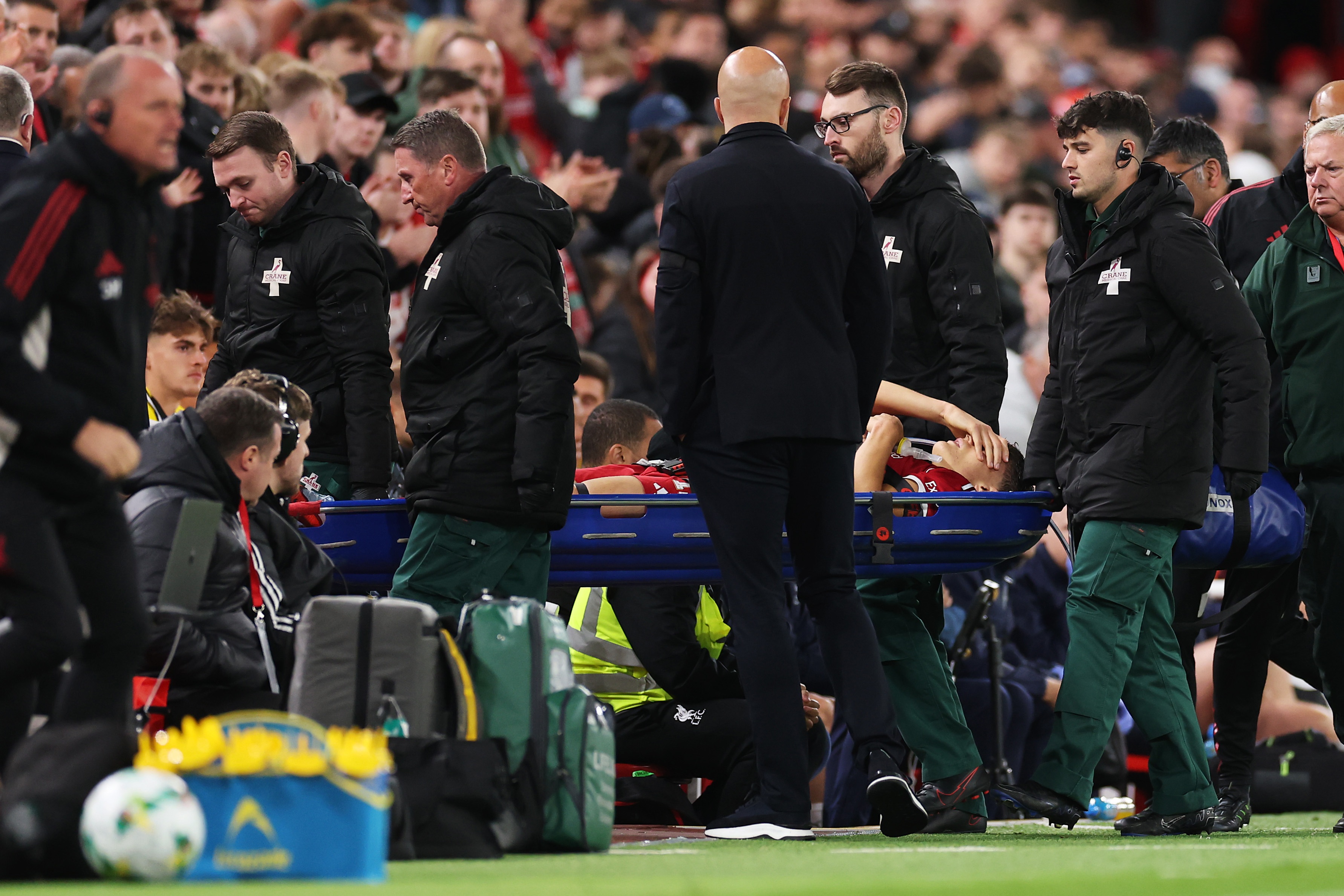 A distraught Giovanni Leoni is stretchered off the pitch.